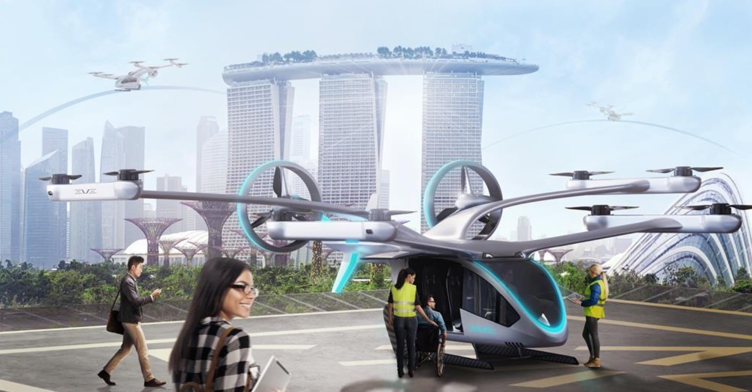 Artist rendering of eVTOL air taxis at a vertiport near Singapore's waterfront skyline.