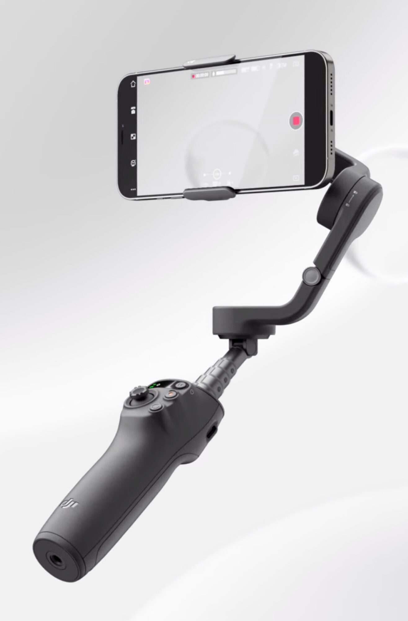 The DJI Osmo Mobile 6 holding a smartphone with its built-in extension rod extended.