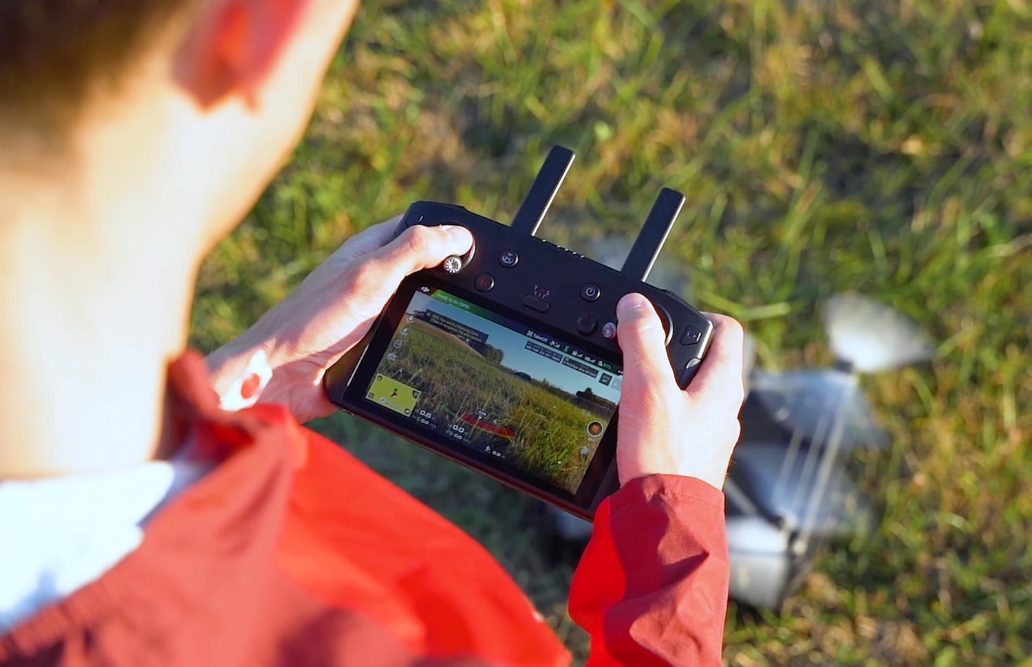 DJI RC Pro controller and its bright display used to monitor the drone feed.