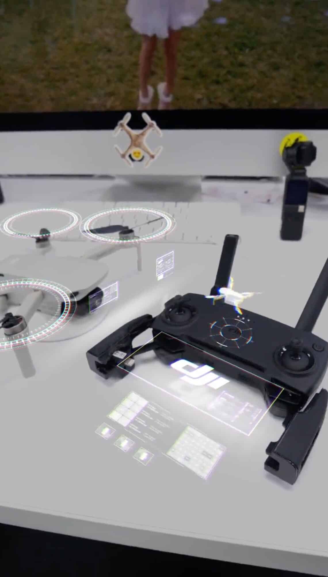 DJI teaser frame overlaying augmented reality panels on a table of gear.