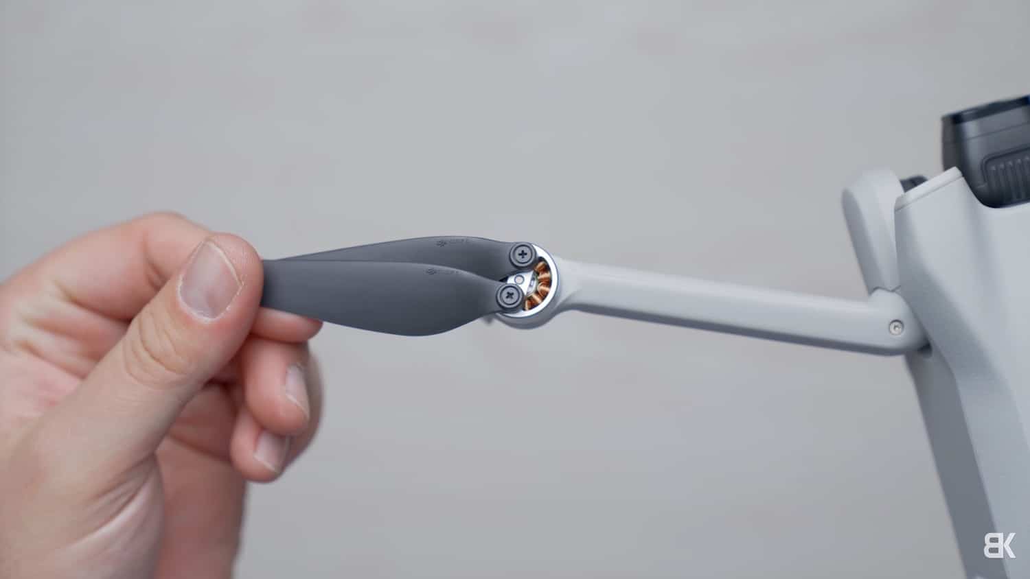 Mini 3 arms unfolded, with propellers held on by tiny screws rather than quick release.
