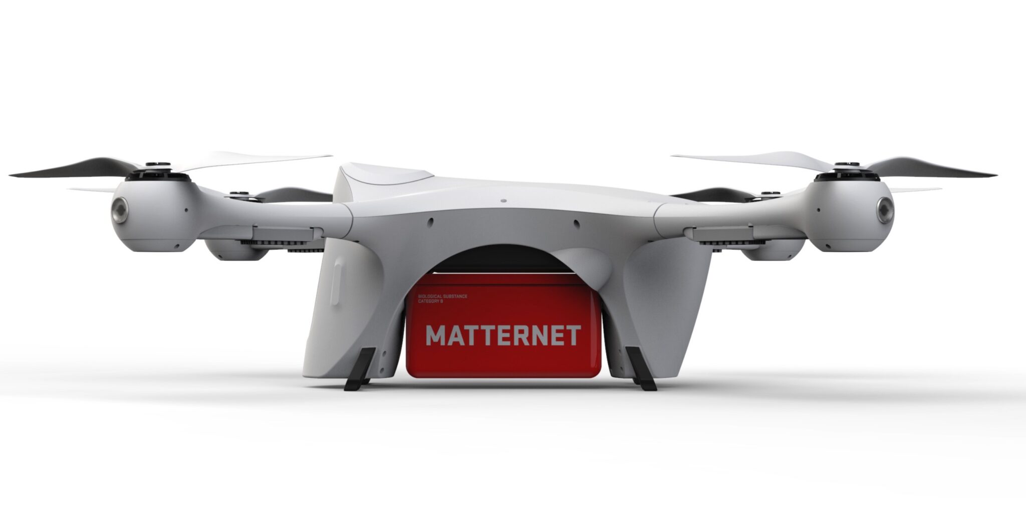 Matternet M2 drone product shot with its red payload container attached.