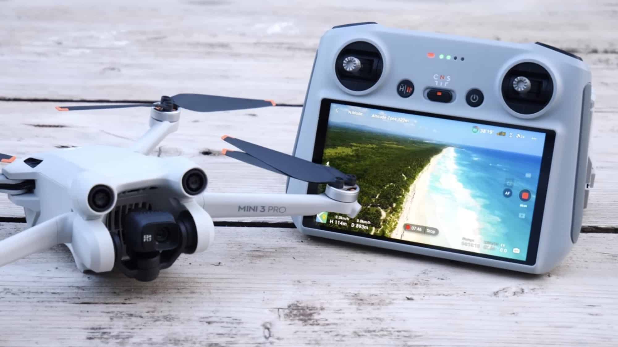 DJI Mini 3 Pro sitting alongside the DJI RC remote controller.