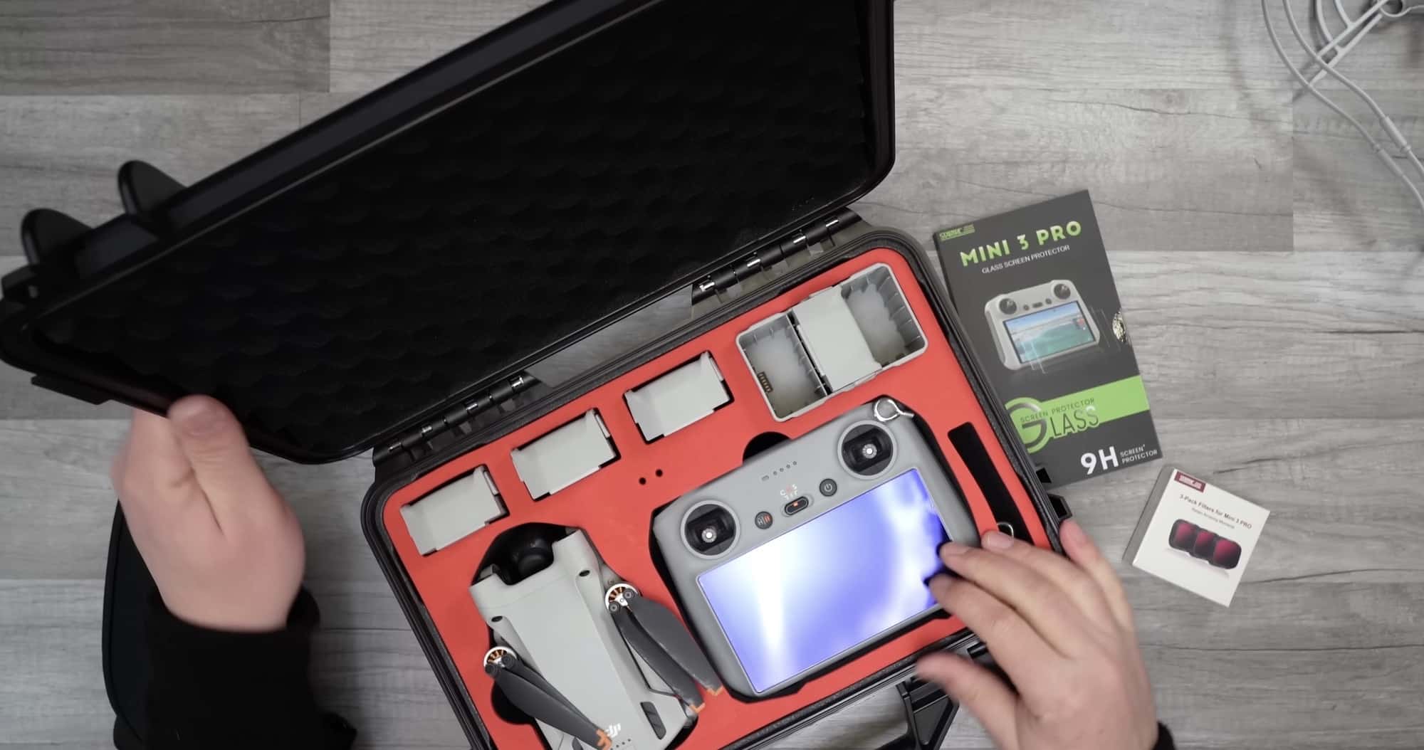 The StartRC hard-sided case for the DJI Mini 3 Pro and its soft foam inserts.