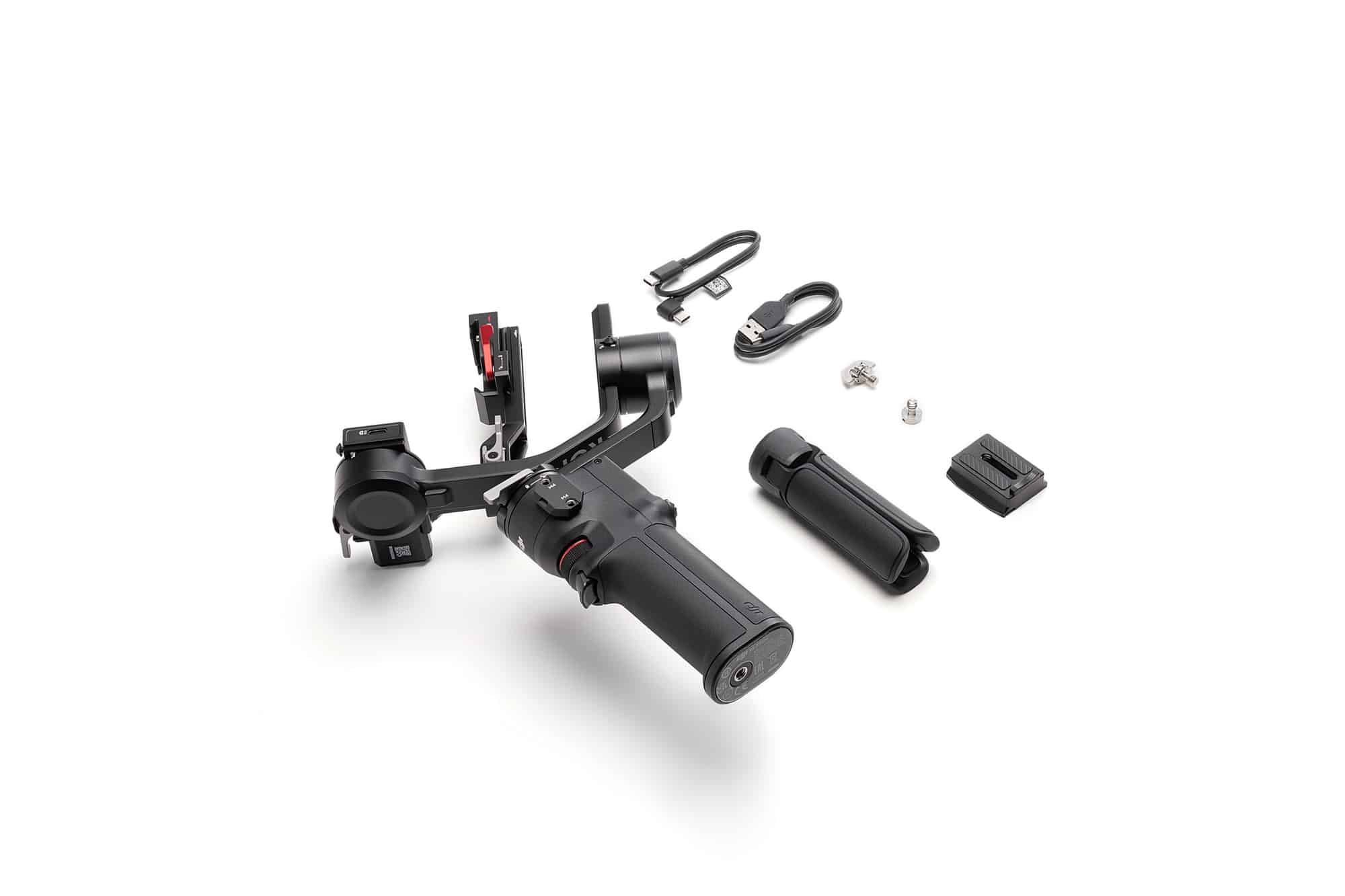 The DJI RS 3 Mini holding a mirrorless camera, with a 4.4-pound (2-kilogram) payload limit.