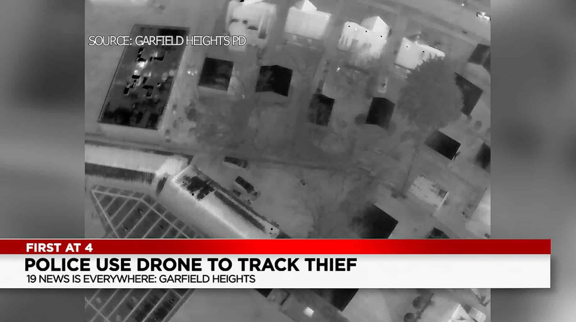 Thermal camera view showing the suspect's body heat signature from the M30 drone.