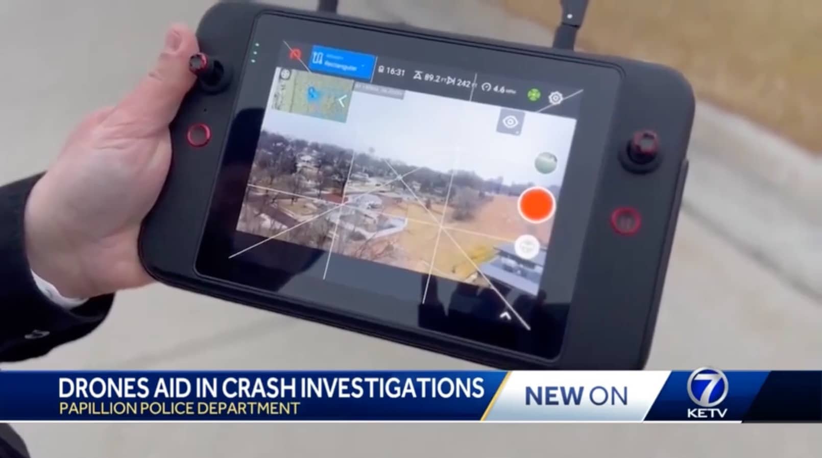 Papillion police set out ground control points across a Nebraska crash scene.