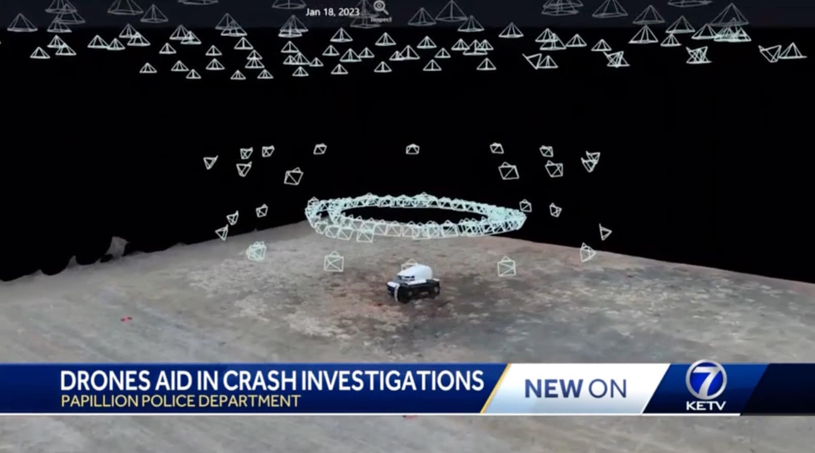 Aerial photos of a crash scene stitched into a 2D photogrammetry map.
