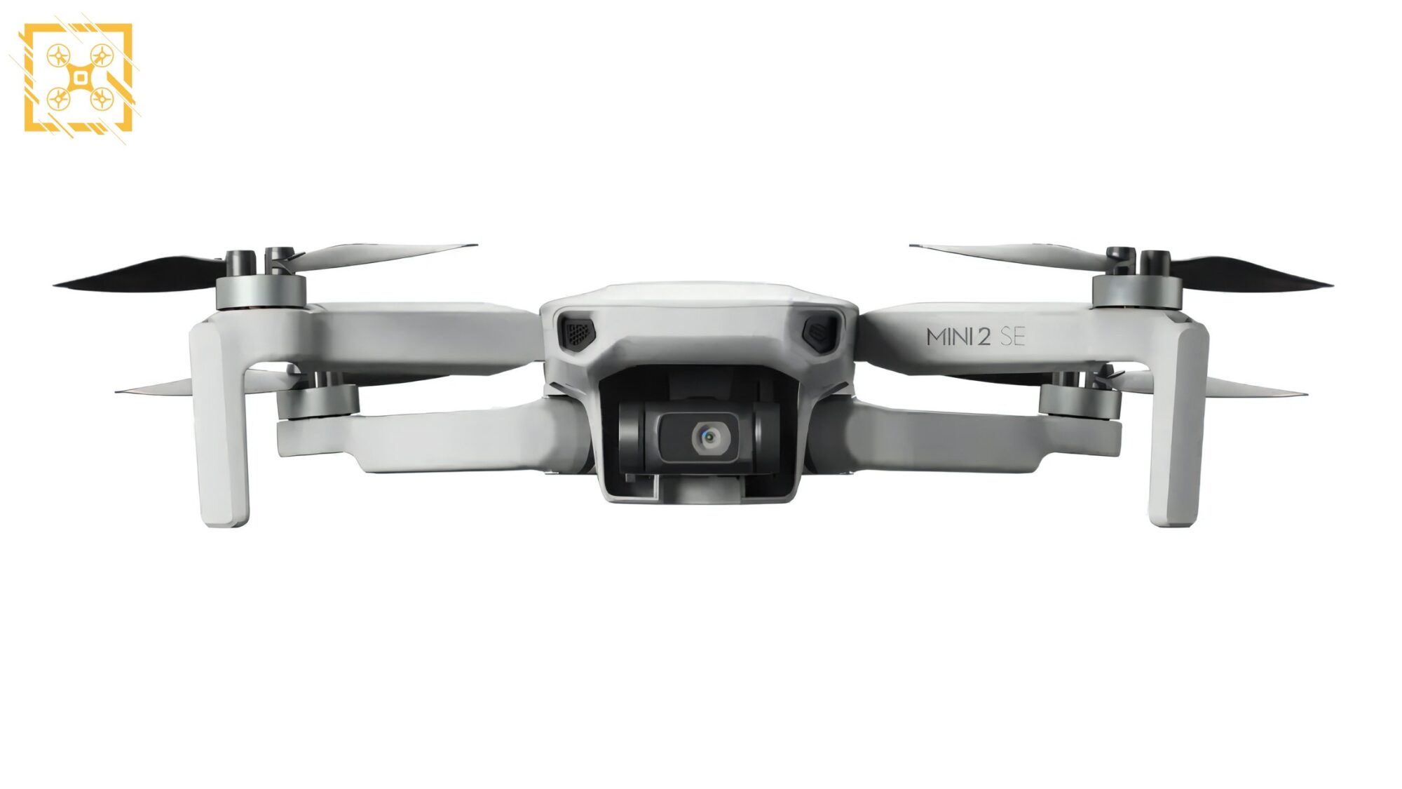 DJI Mini 2 SE unfolded with propellers extended, ready to launch.