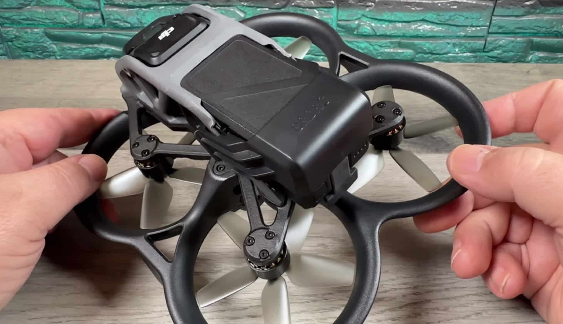 FPV battery strap wrapped around the DJI Avata to hold the battery in.