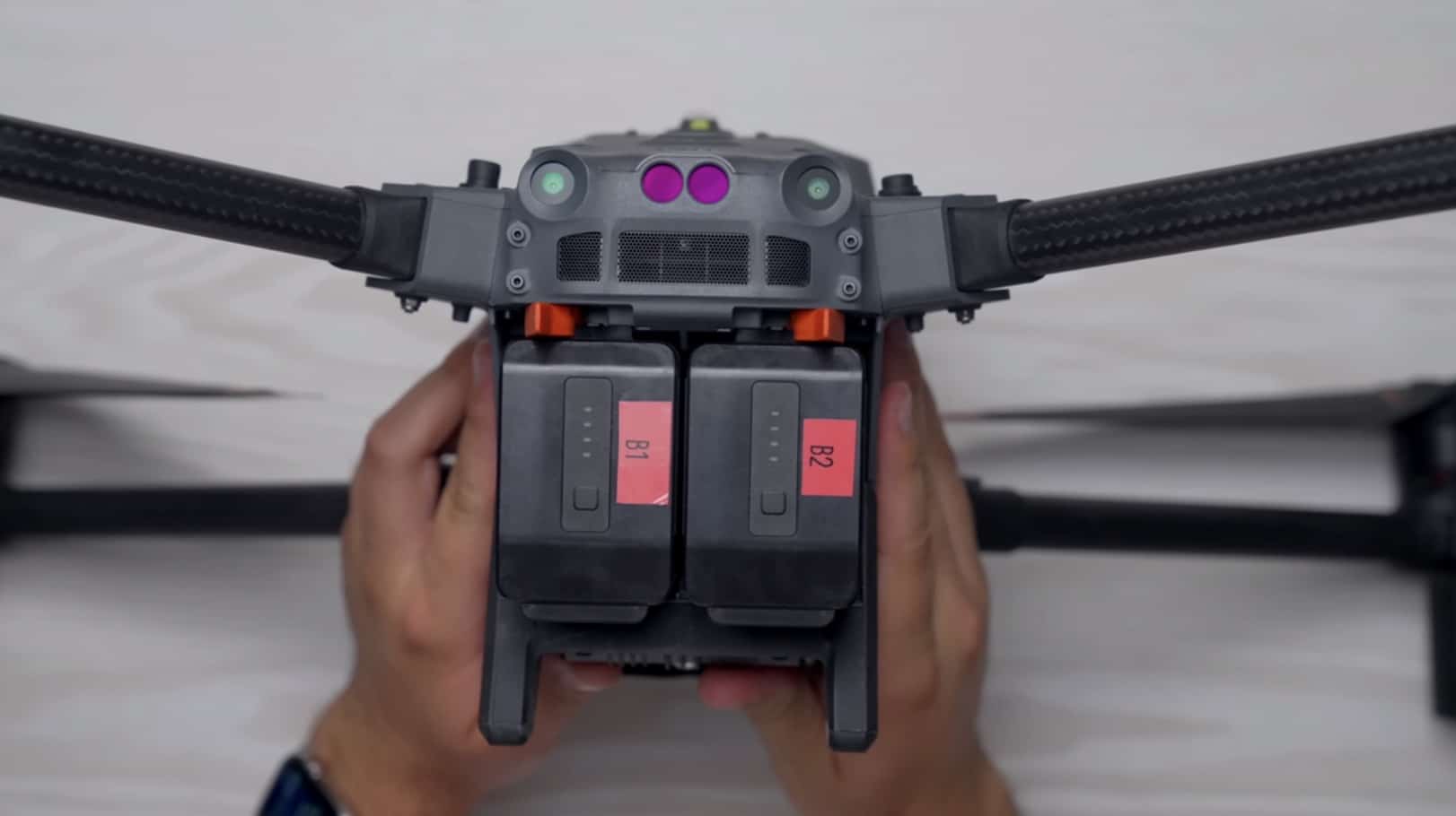 Hot-swapping the dual batteries on the DJI Matrice 30T between search flights.
