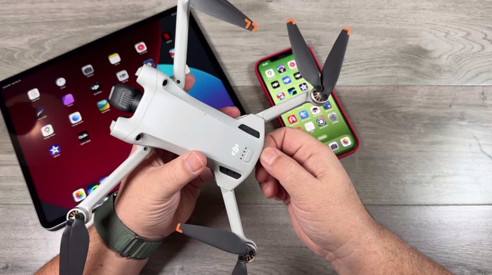 MicroSD card pulled from the DJI Mini 3 Pro for use in a card reader.