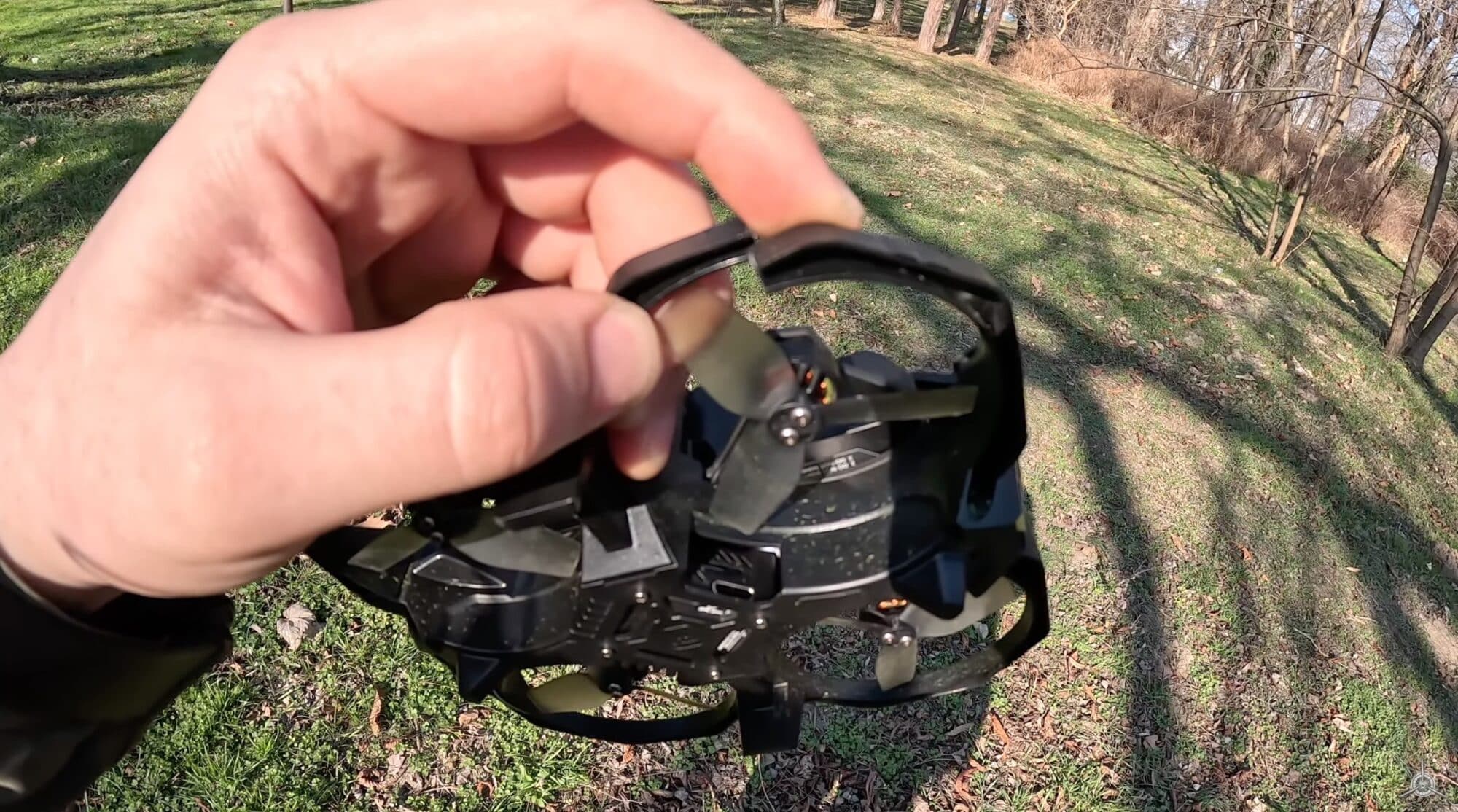 The cracked plastic frame on the Defender 25 after a light branch strike.