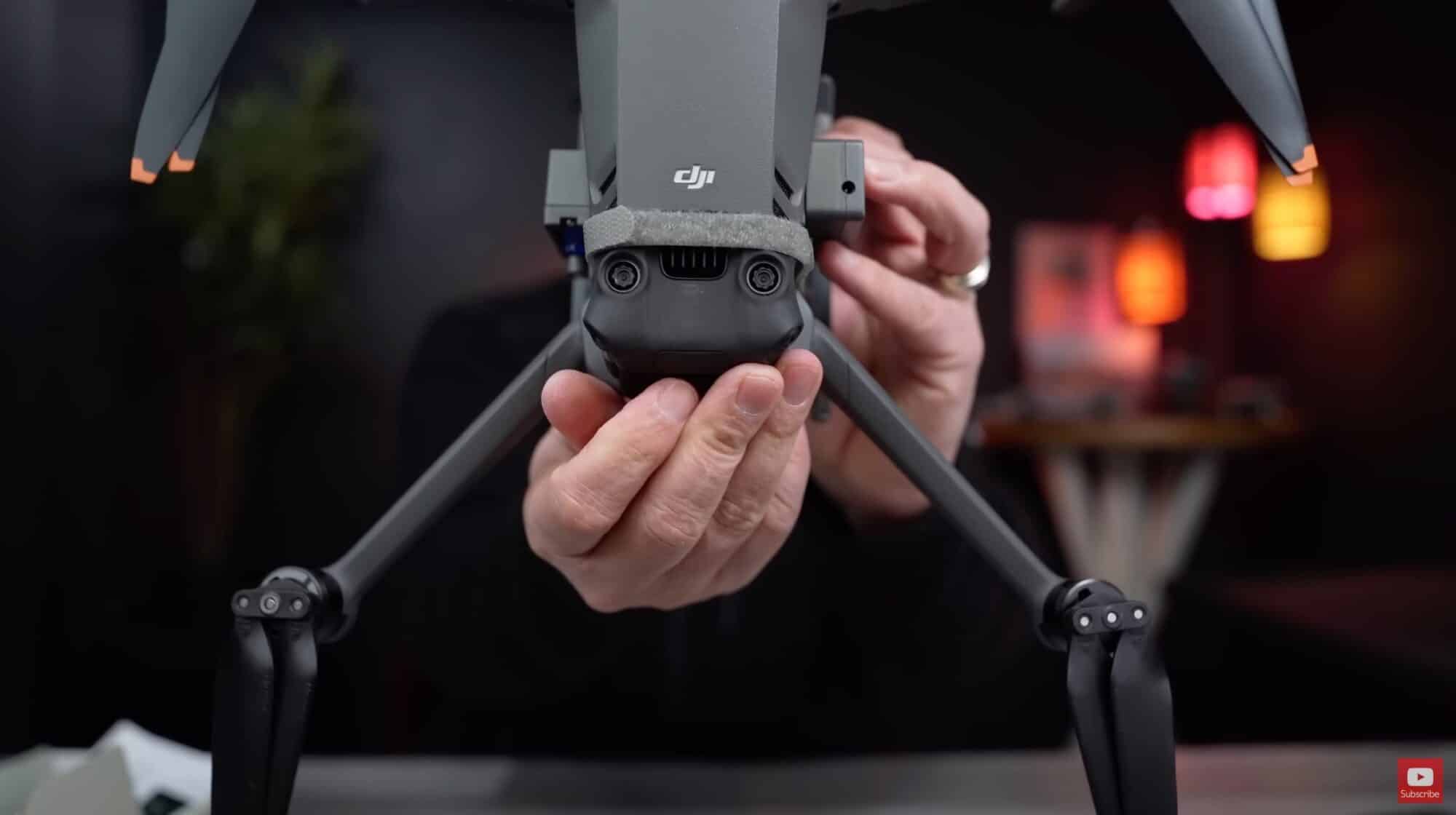 The Hanatora release clipped under the DJI Mavic 3 with its landing gear attached.