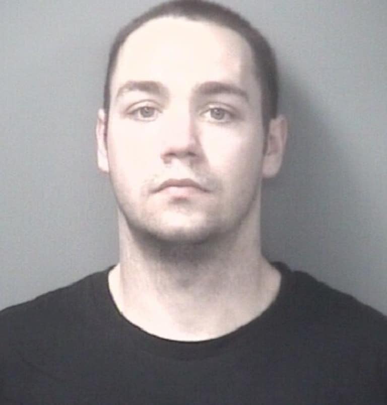 Police booking photograph of the wanted felon located by a thermal drone.