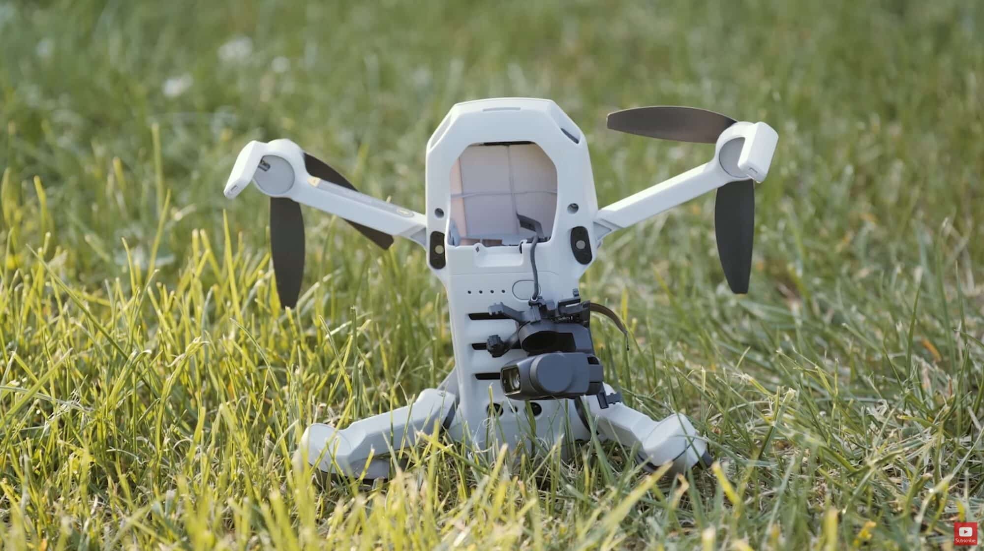 A small foldable drone at distance, still inside the pilot's visual line of sight.