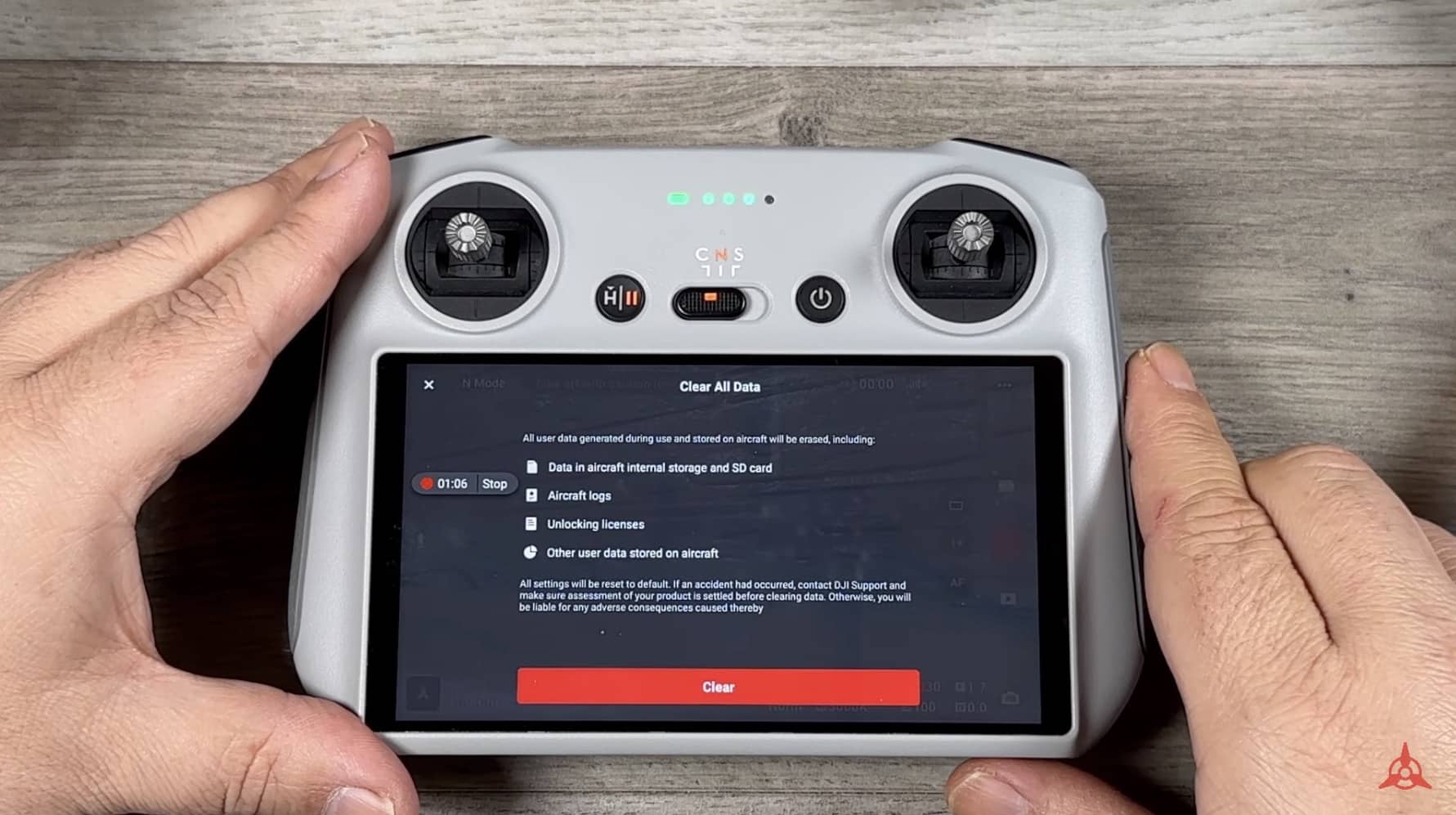 DJI RC screen showing the clear all data prompt before wiping the drone.