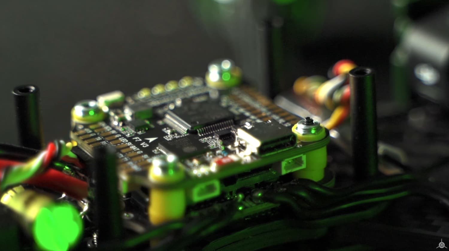 The solder-free F7 V3 flight stack wired up inside the FPV build.