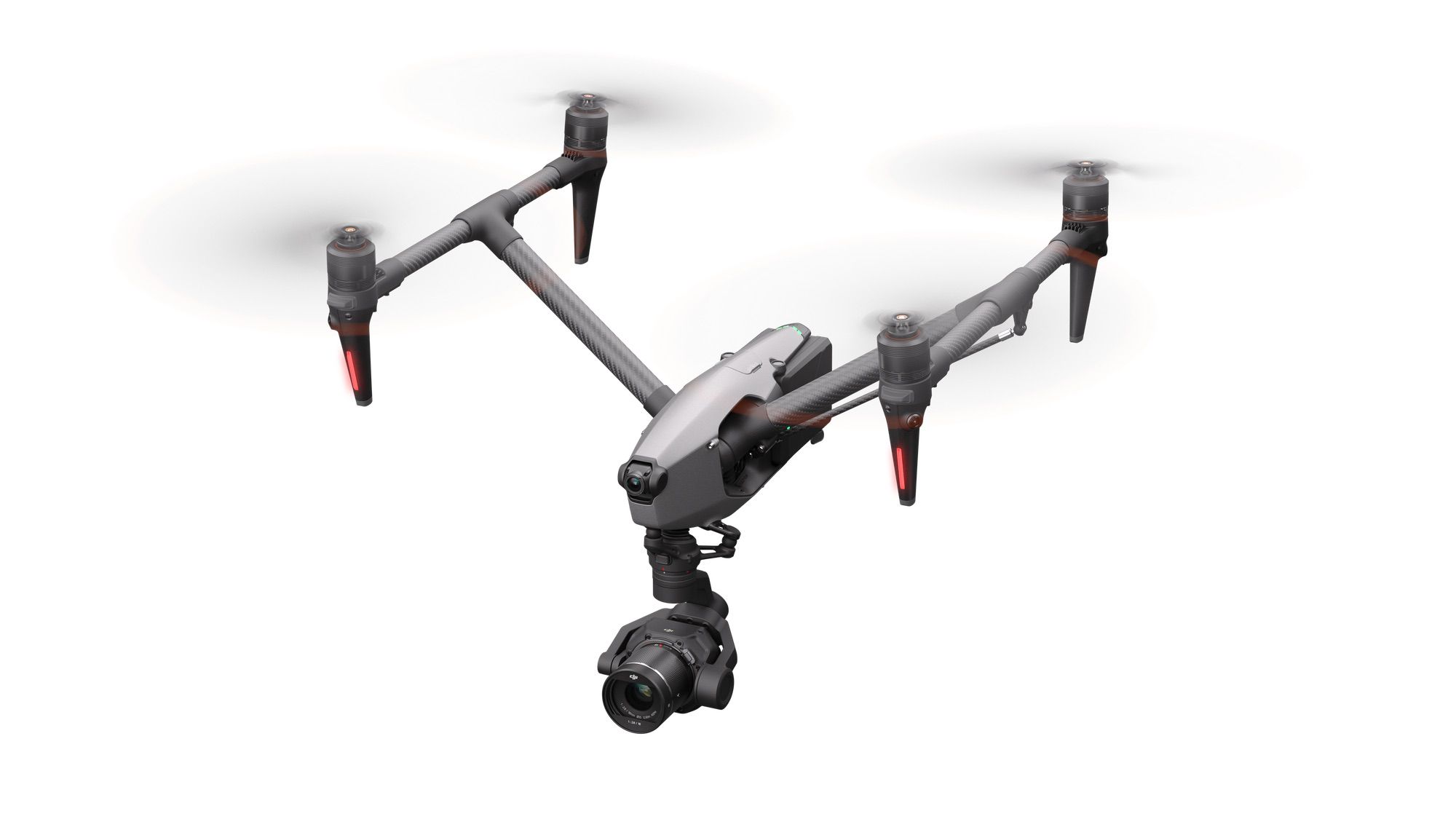 Left-side overview of the Inspire 3 with its propellers spinning.