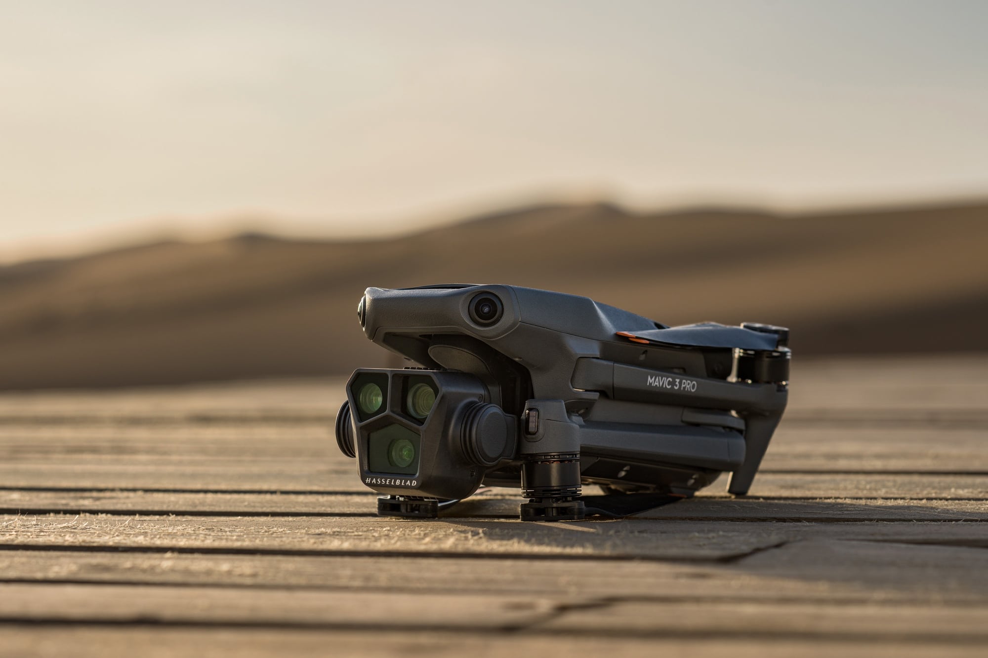 The Mavic 3 Pro pictured outdoors in DJI's launch lifestyle series.
