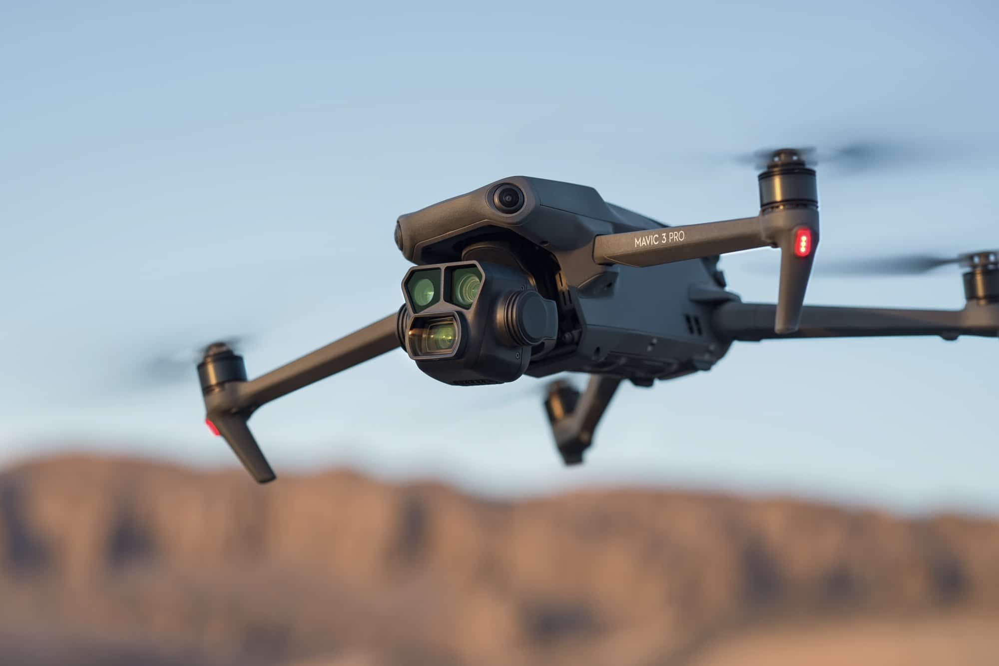The Mavic 3 Pro airborne, its 7x tele camera keeping distance from the subject.