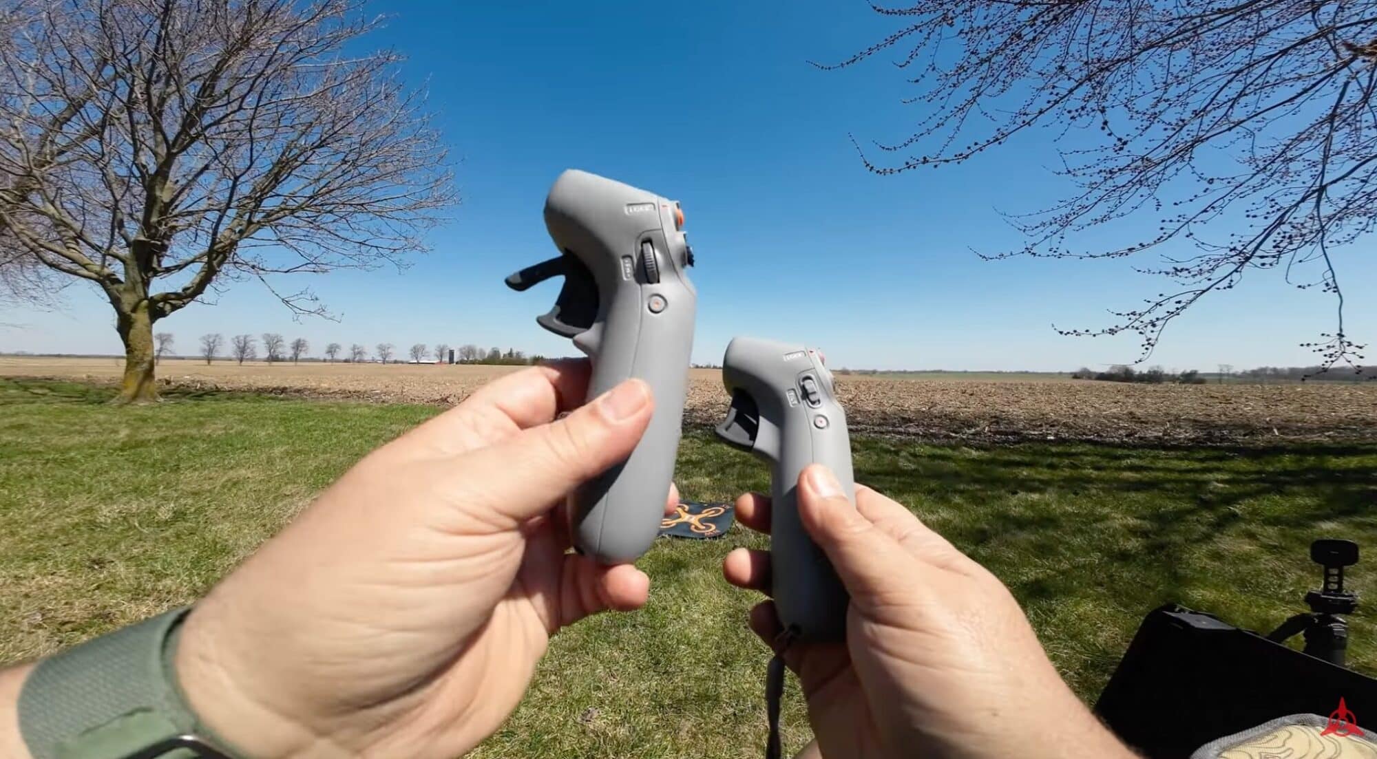 Original DJI Motion Controller beside the new Motion 2 and its added joystick.