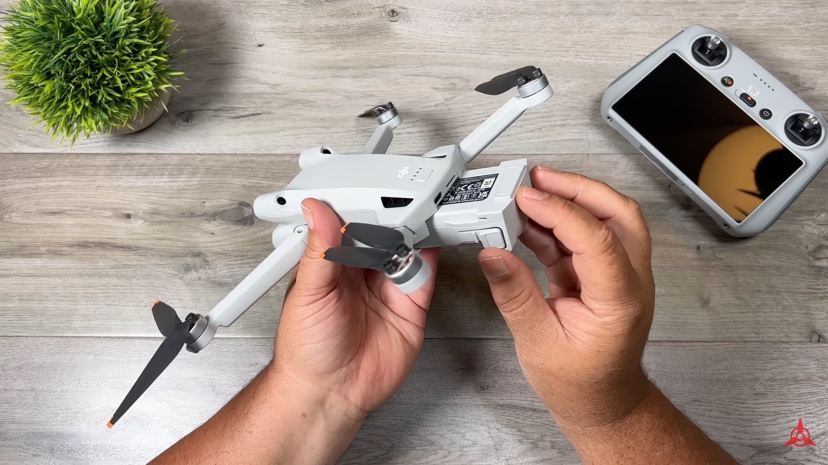 Rear of the DJI Mini 3 Pro with its built-in battery and memory card slot.