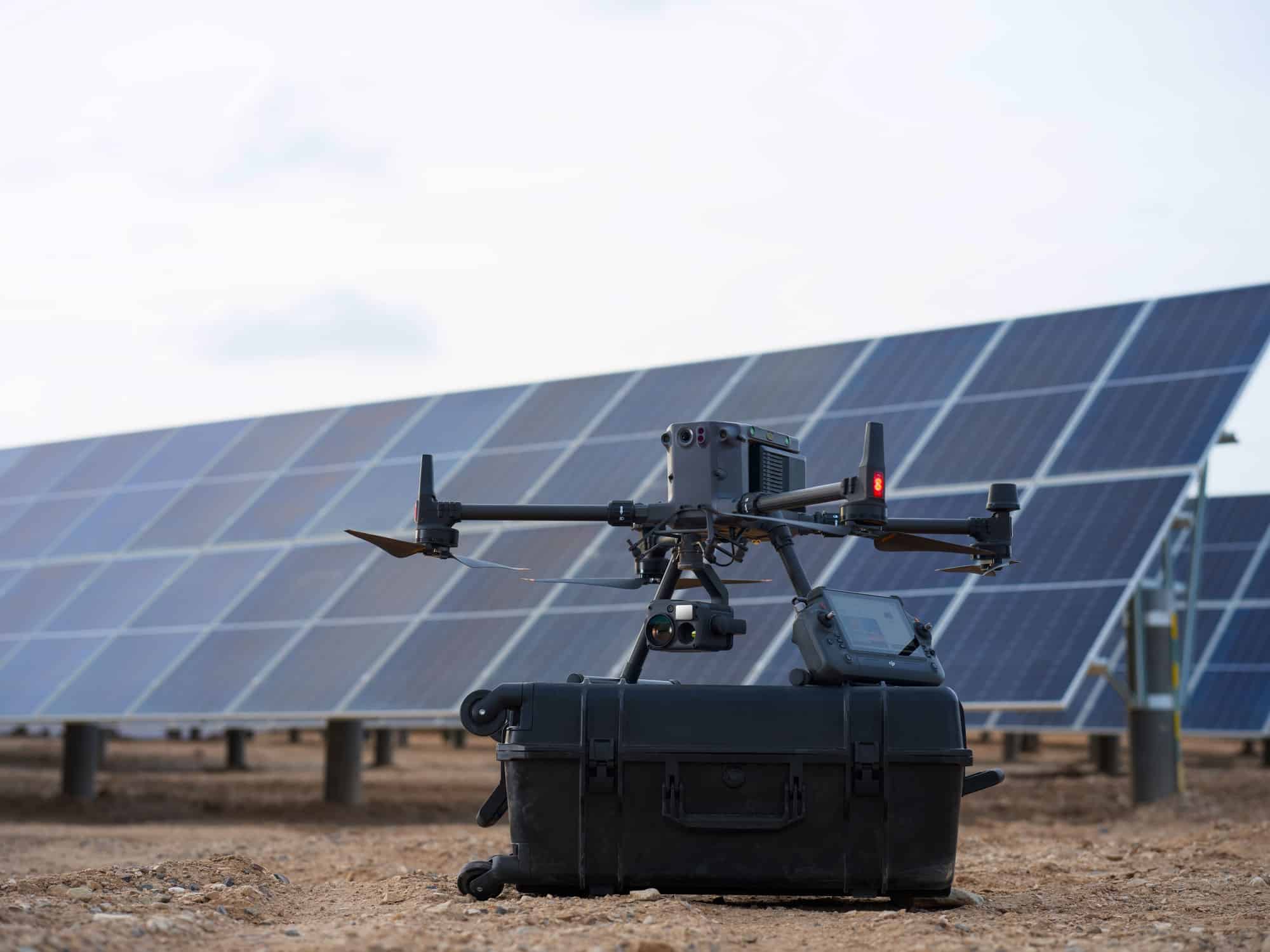 DJI Matrice 350 RTK in flight with its four-antenna transmission system.