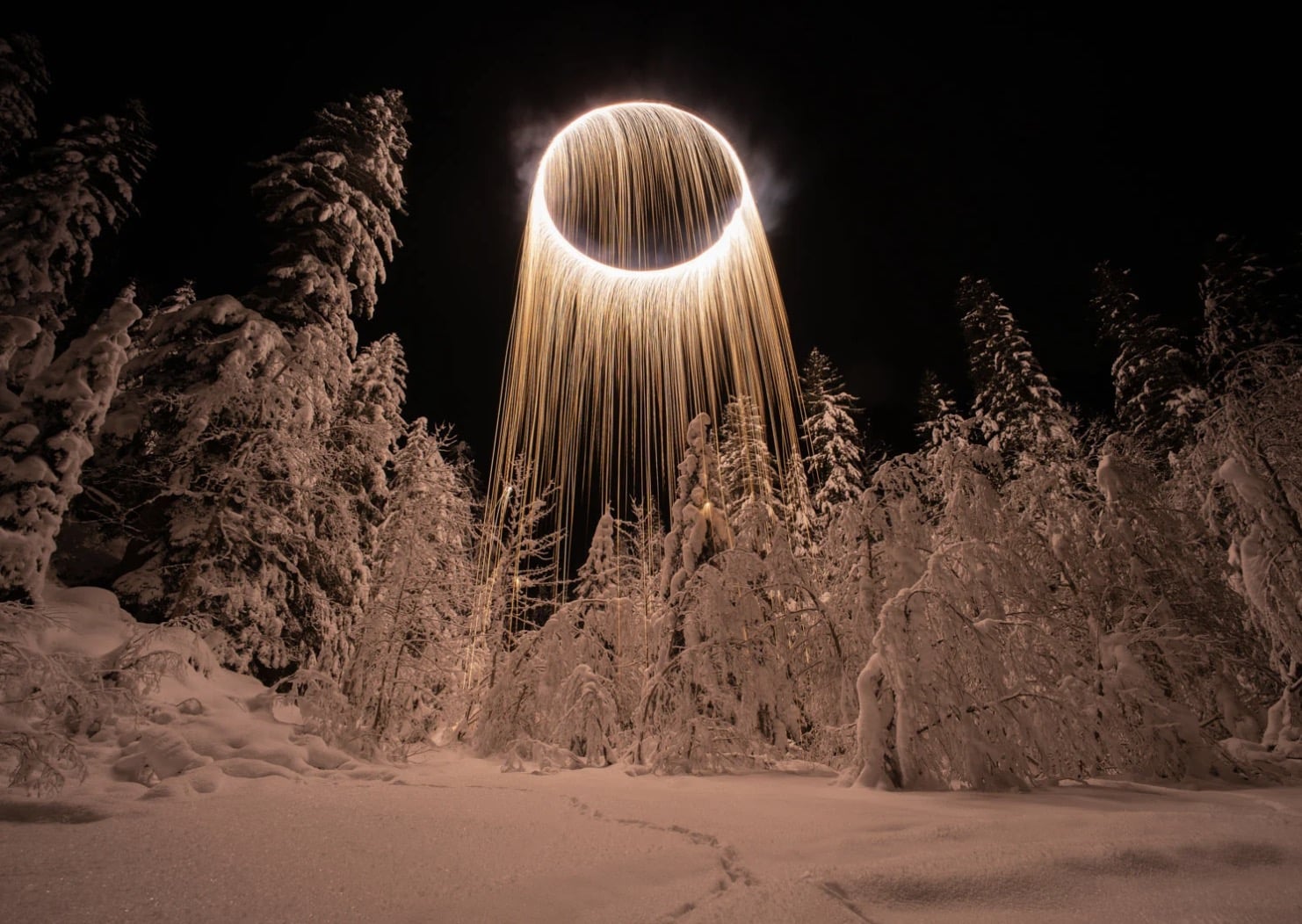 Closing frame from Jadikan's drone light-painting shoot in the French Alps.
