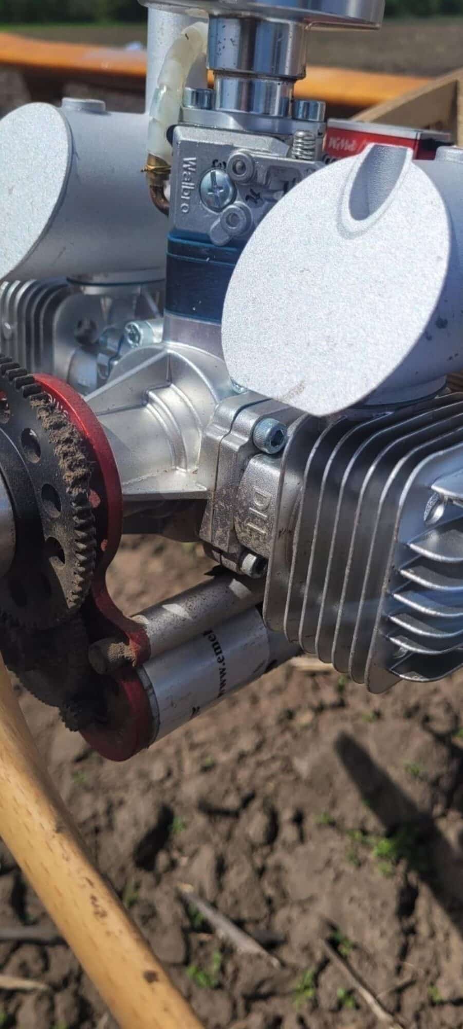 Component detail from the wooden drone, which mixes Chinese-made engines and electronics.