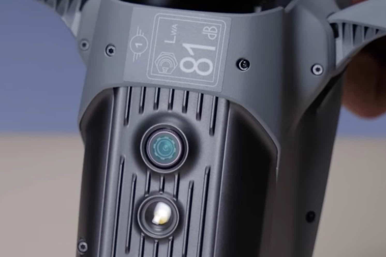 Close-up of the Air 3 underside showing its 81 dB sound power label.