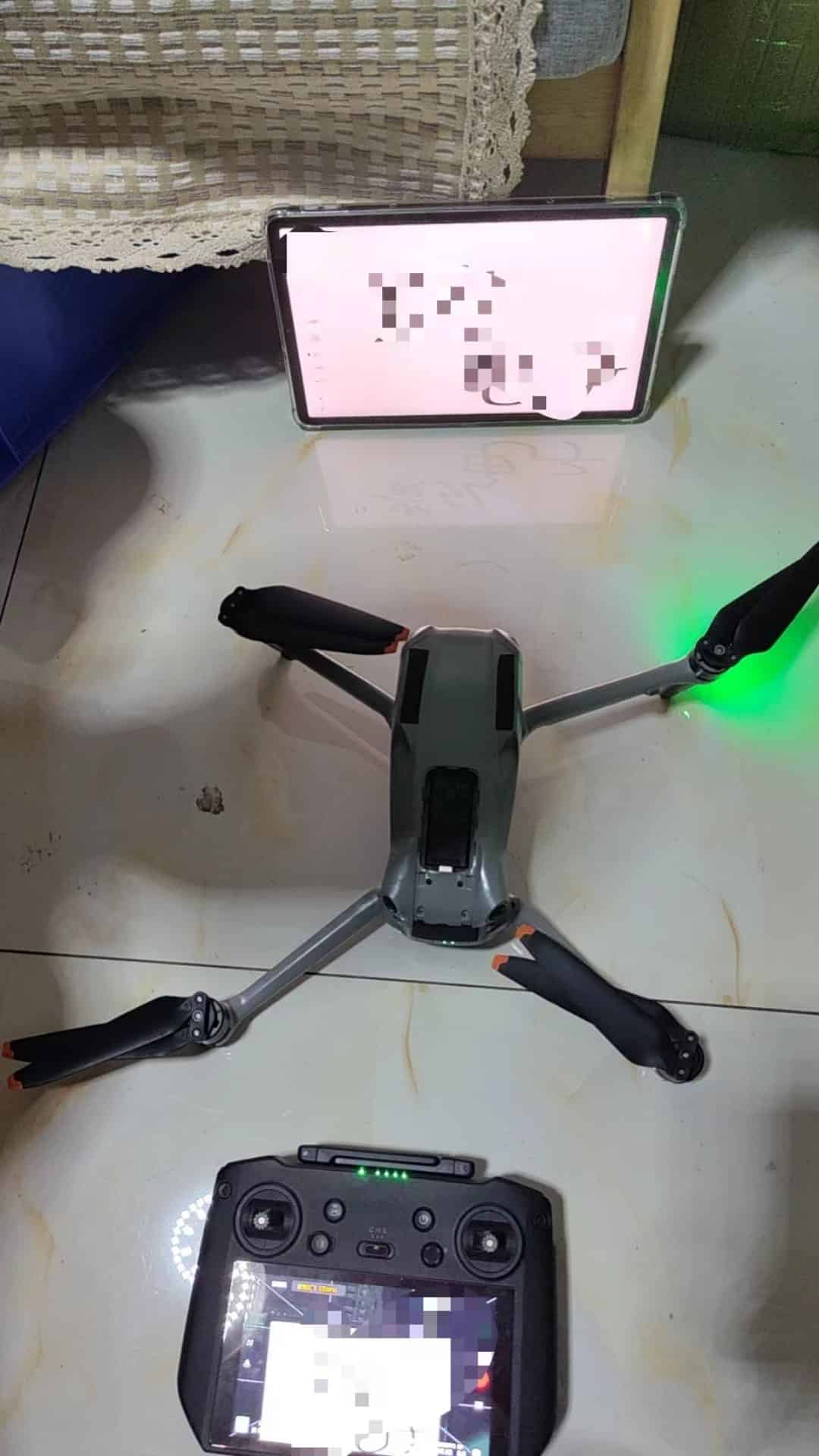 Rear of the DJI Air 3 with air vents, micro SD slot and USB-C port.