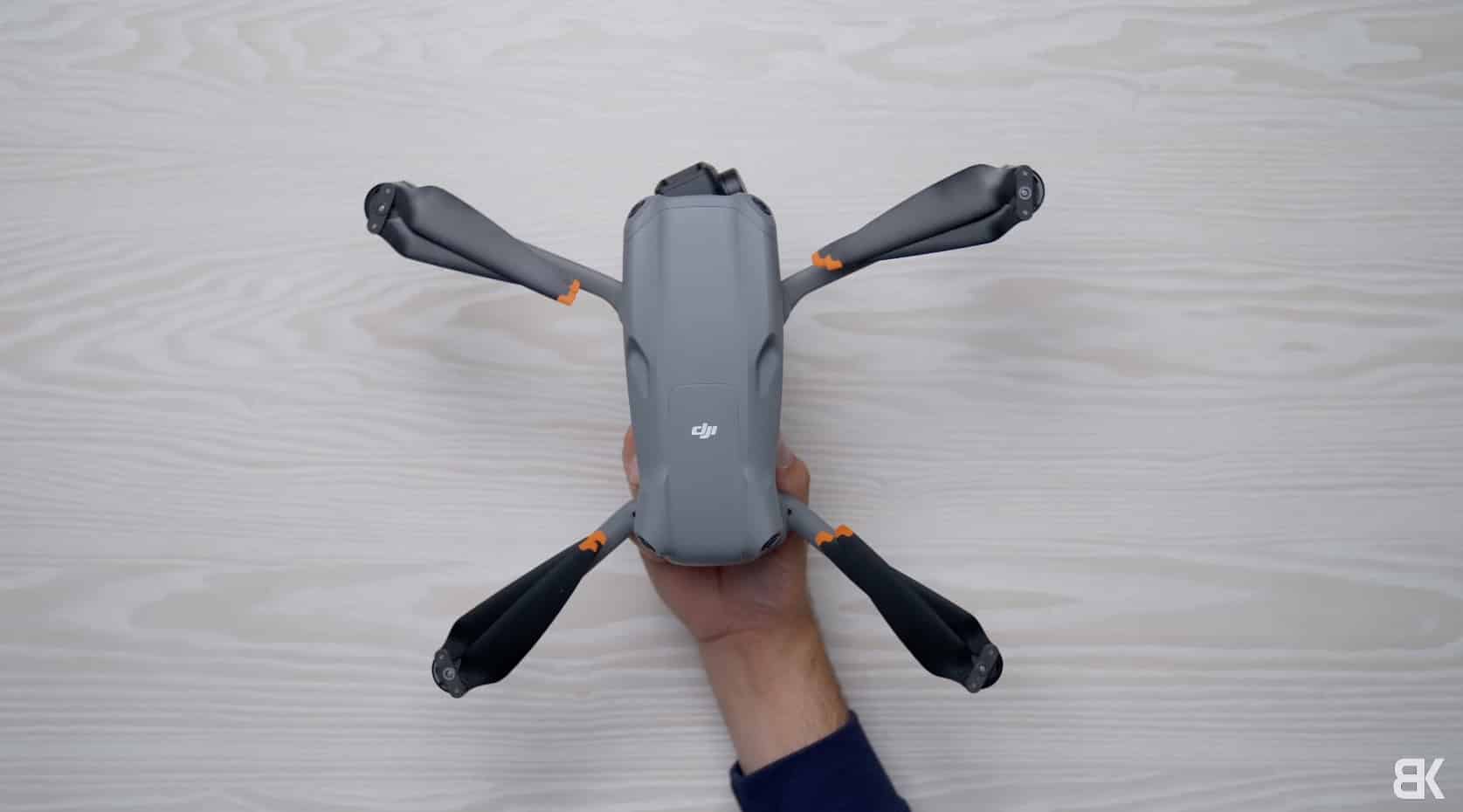 The DJI Air 3 unfolded on the table beside the outgoing DJI Air 2S.