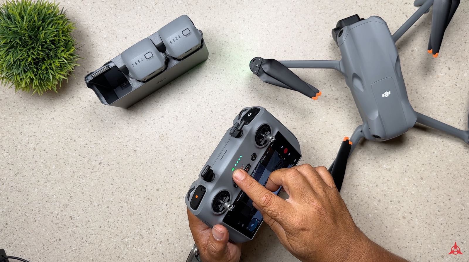 Powering on the DJI Air 3 and the DJI RC2 controller for the first time.