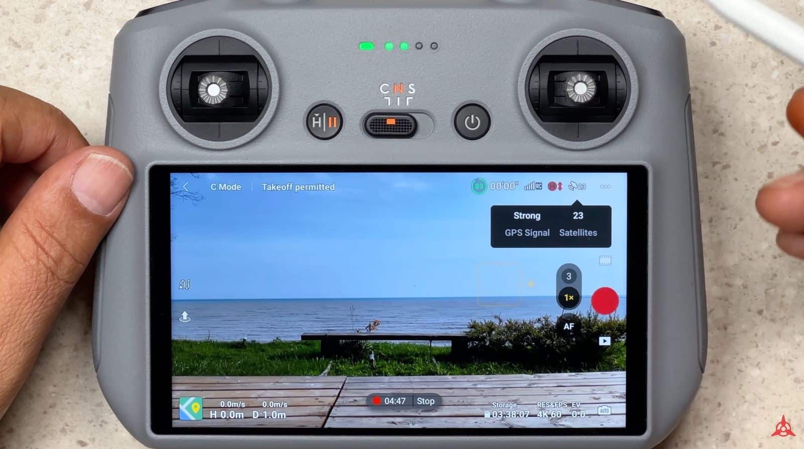 DJI Fly app showing 24 satellites connected before takeoff.