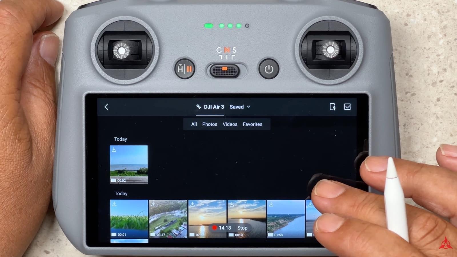 Low-resolution playback of cached DJI Air 3 footage on the DJI RC2 screen.