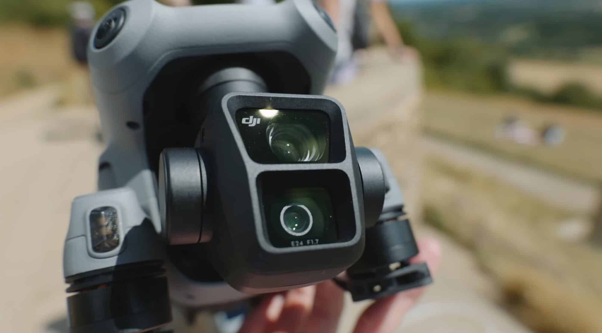 Kai Wong with the DJI drone lineup whose model names all end in three.