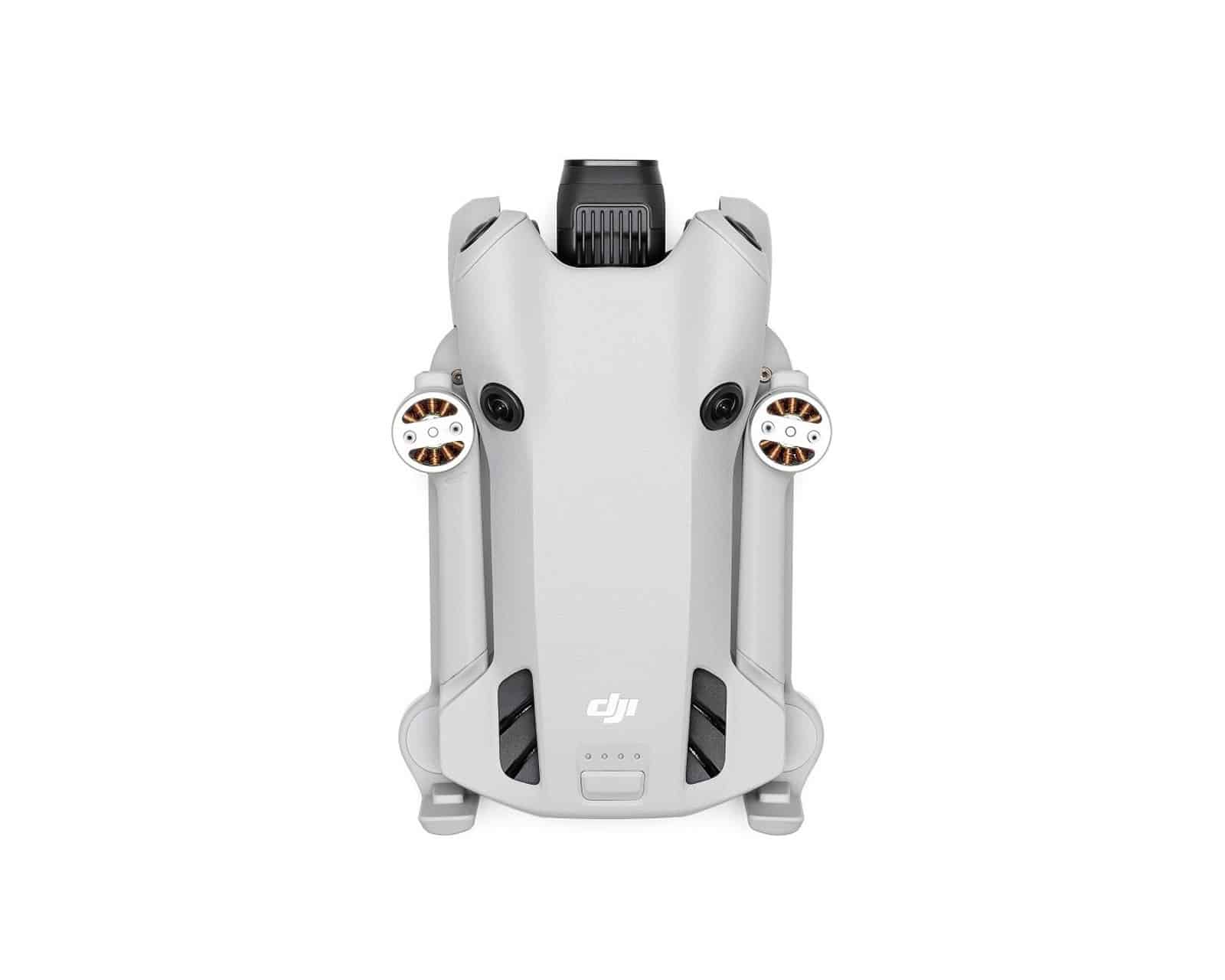DJI Mini 4 Pro from the side, with the omnidirectional obstacle sensors visible.