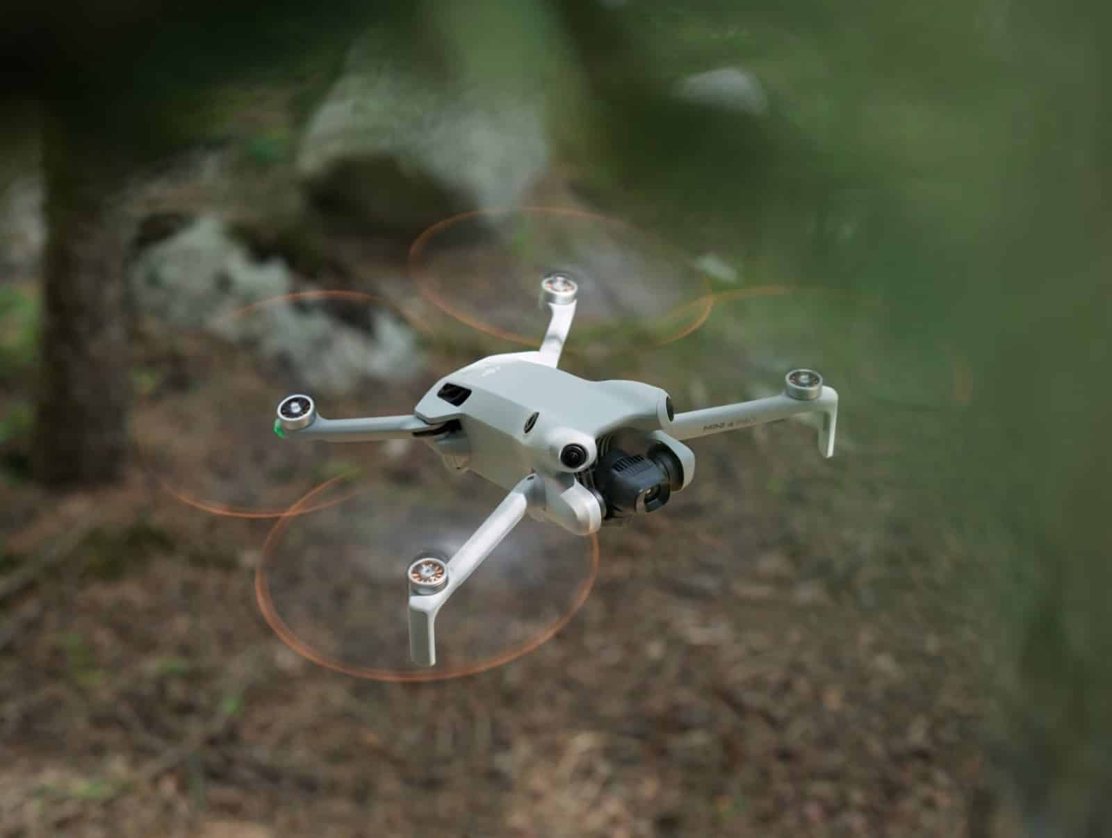 DJI Mini 4 Pro viewed from directly above with its arms unfolded.
