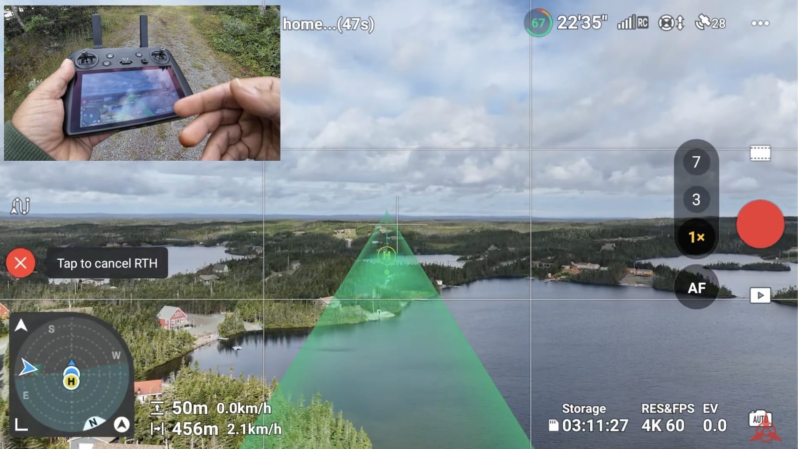 App screen displaying the green augmented reality return-to-home route over forest.