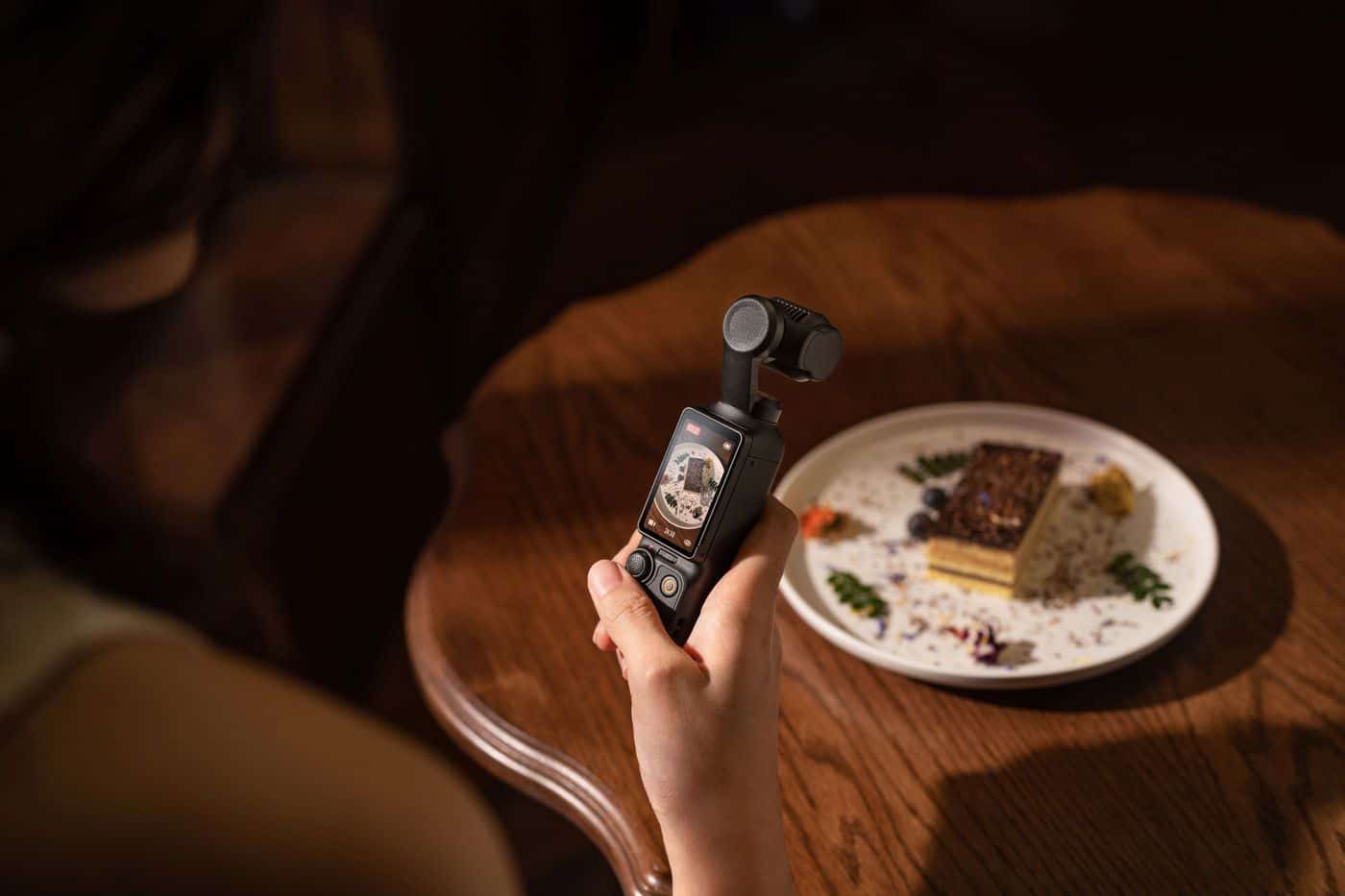 DJI Osmo Pocket 3 pocket gimbal camera featured in this firmware update coverage.
