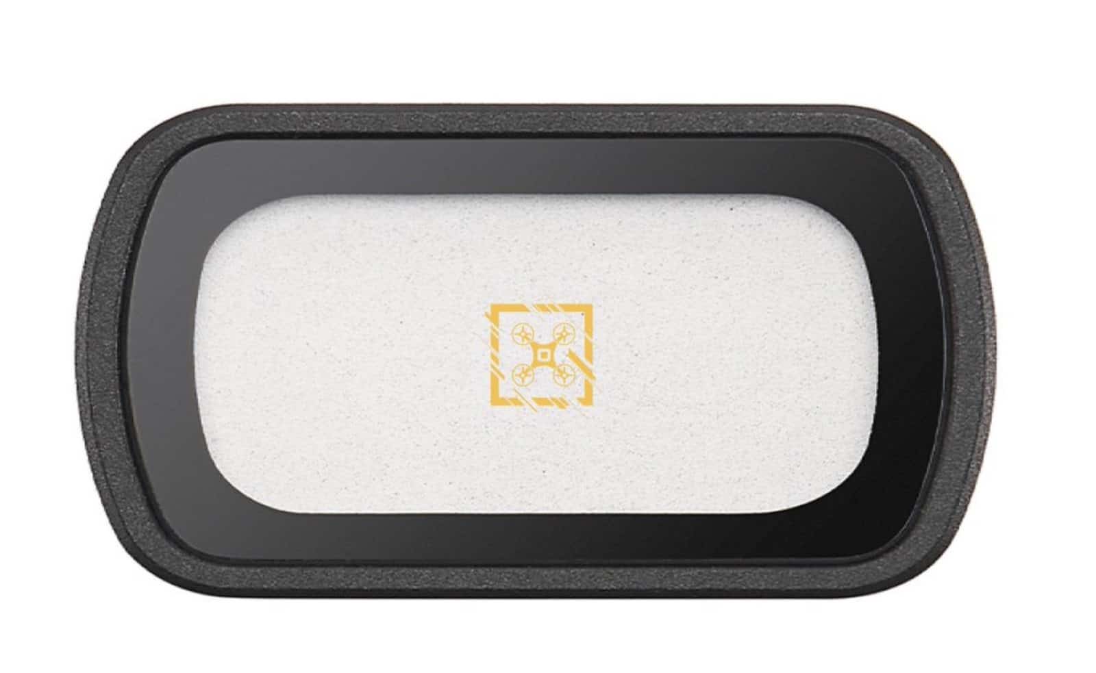 The DJI Osmo Pocket 3 camera with a black mist filter attached.