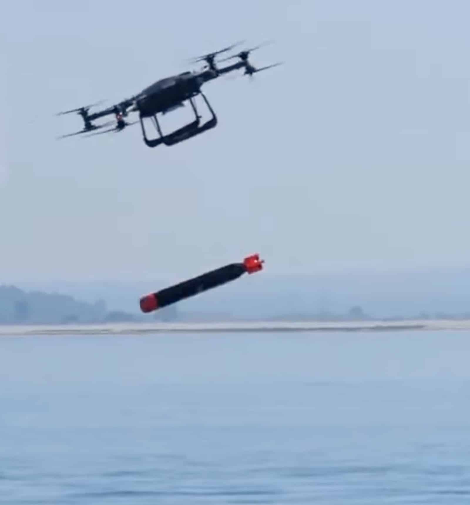 The T-600 releases the inert torpedo over the sea during the NATO REPMUS exercise.