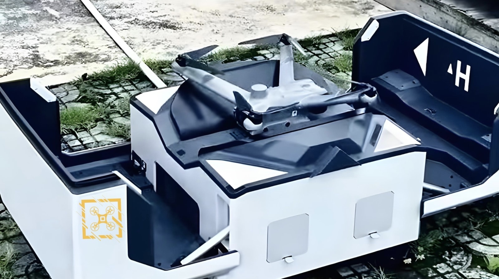 Leaked photo of an open DJI Dock Mini with the Matrice 3D folded inside.