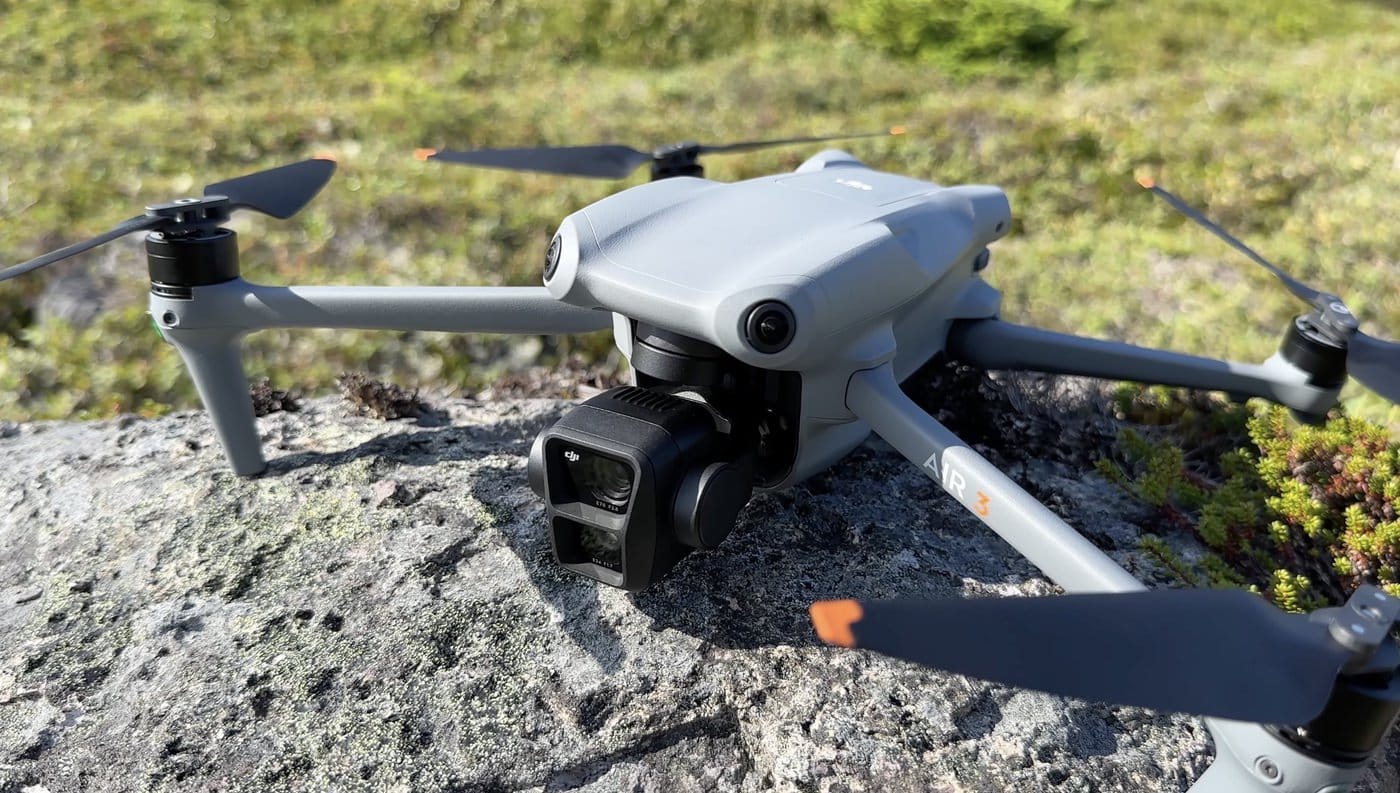 The DJI Air 3 in flight, described as the most versatile drone in the lineup.