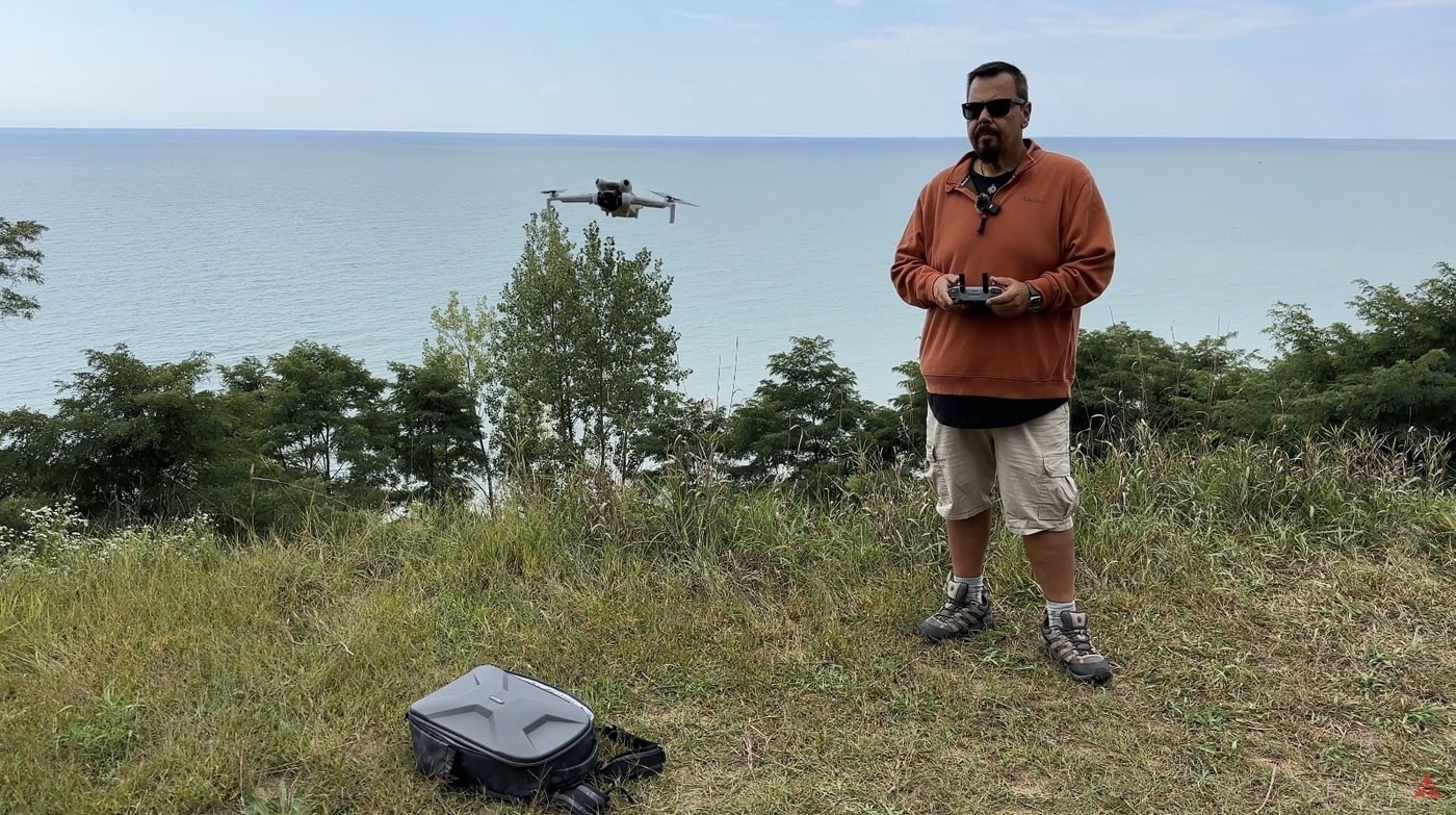 Shawn's full DJI drone lineup laid out on the table to close the buyers guide.