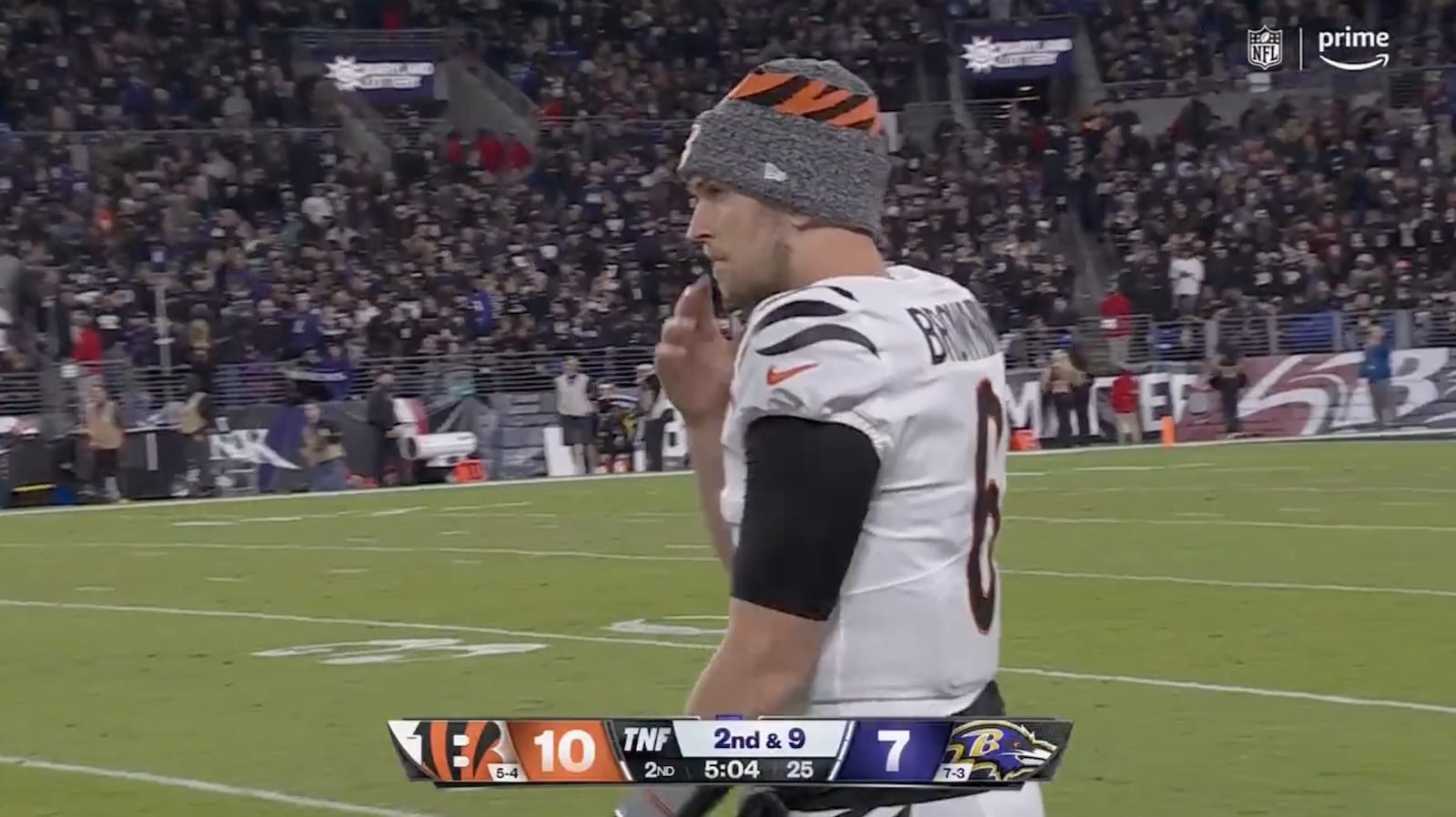 Broadcast still of a Bengals player on the field during the delayed game.