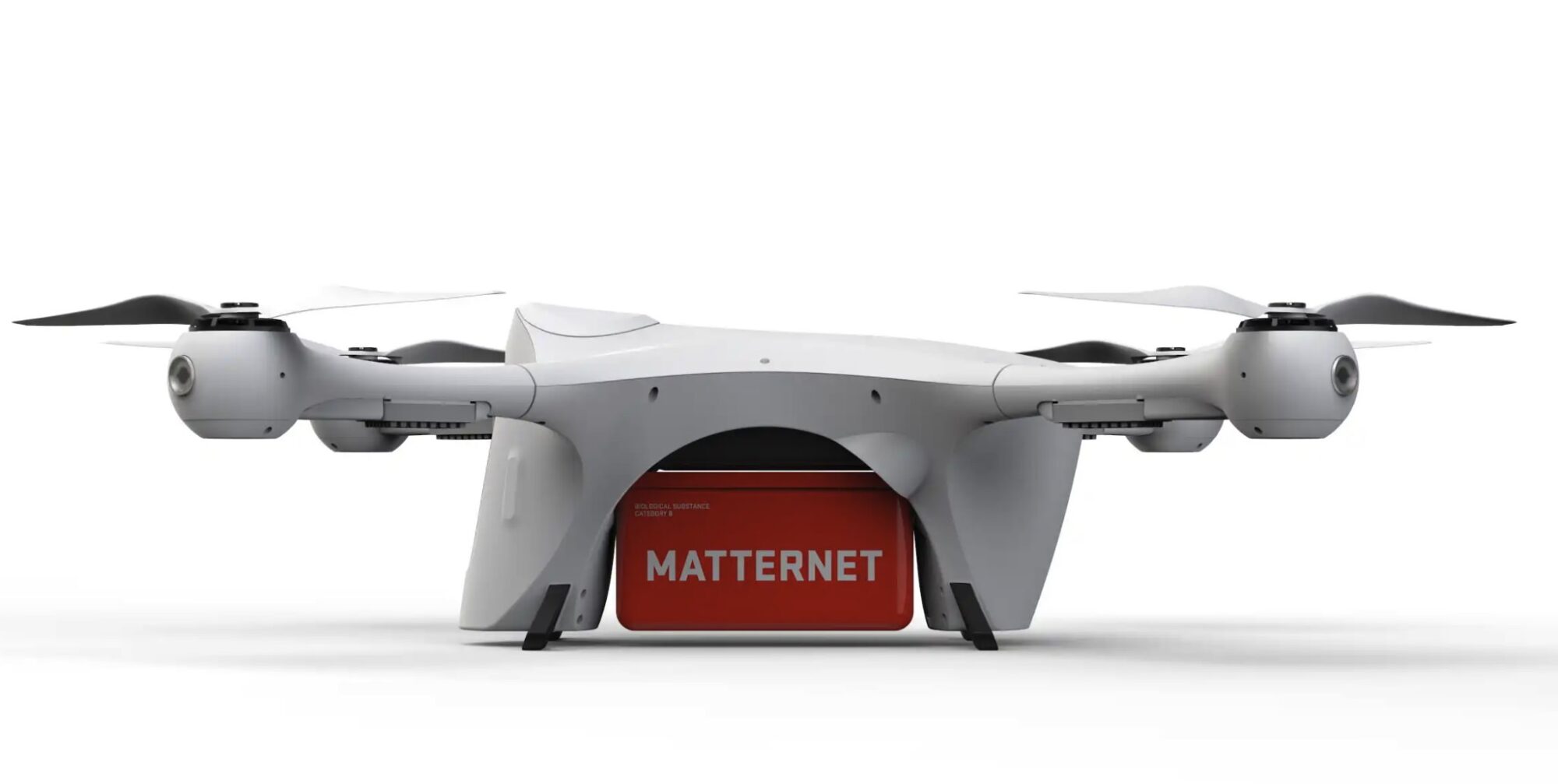 Product shot of the white Matternet M2 delivery drone with red branding panel.