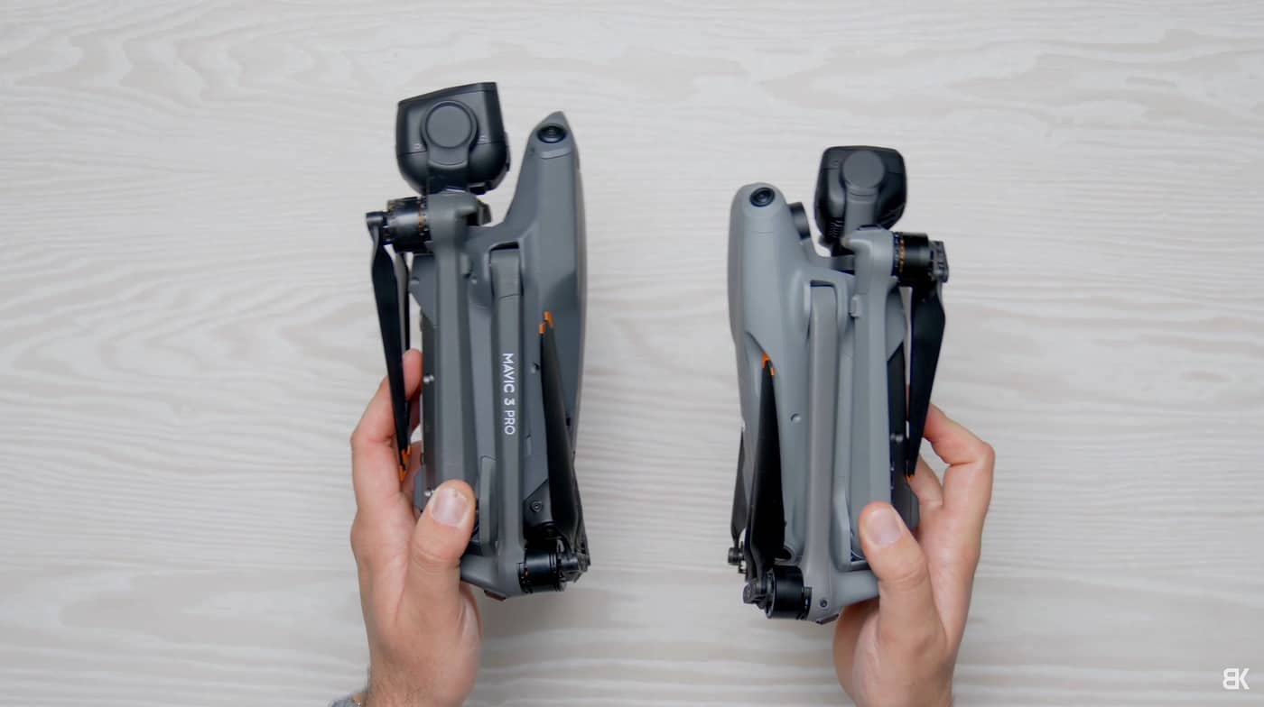 The dual-camera nose of the DJI Air 3 next to the Mavic 3 Pro camera cluster.