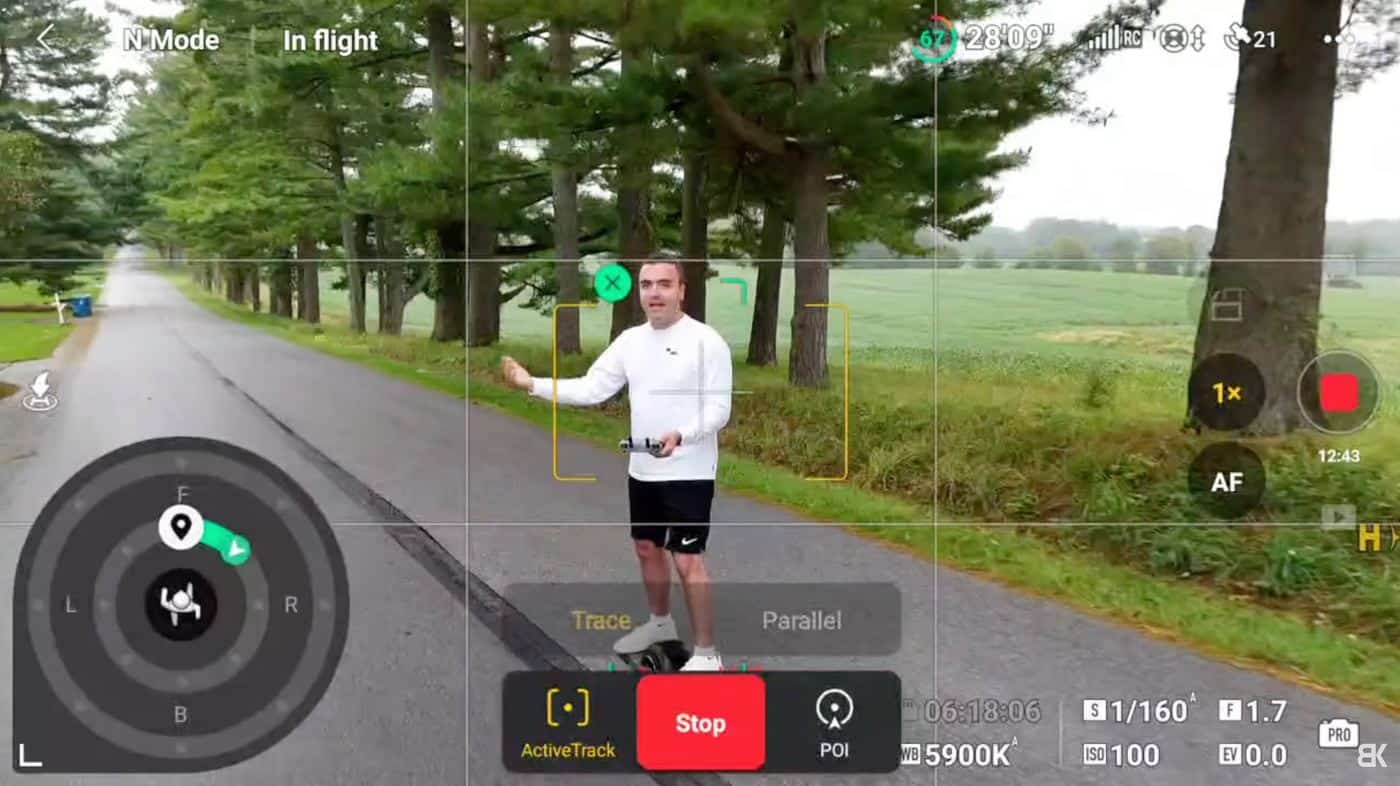 Cruise control carrying the Mini 4 Pro toward a distant point without stick input.
